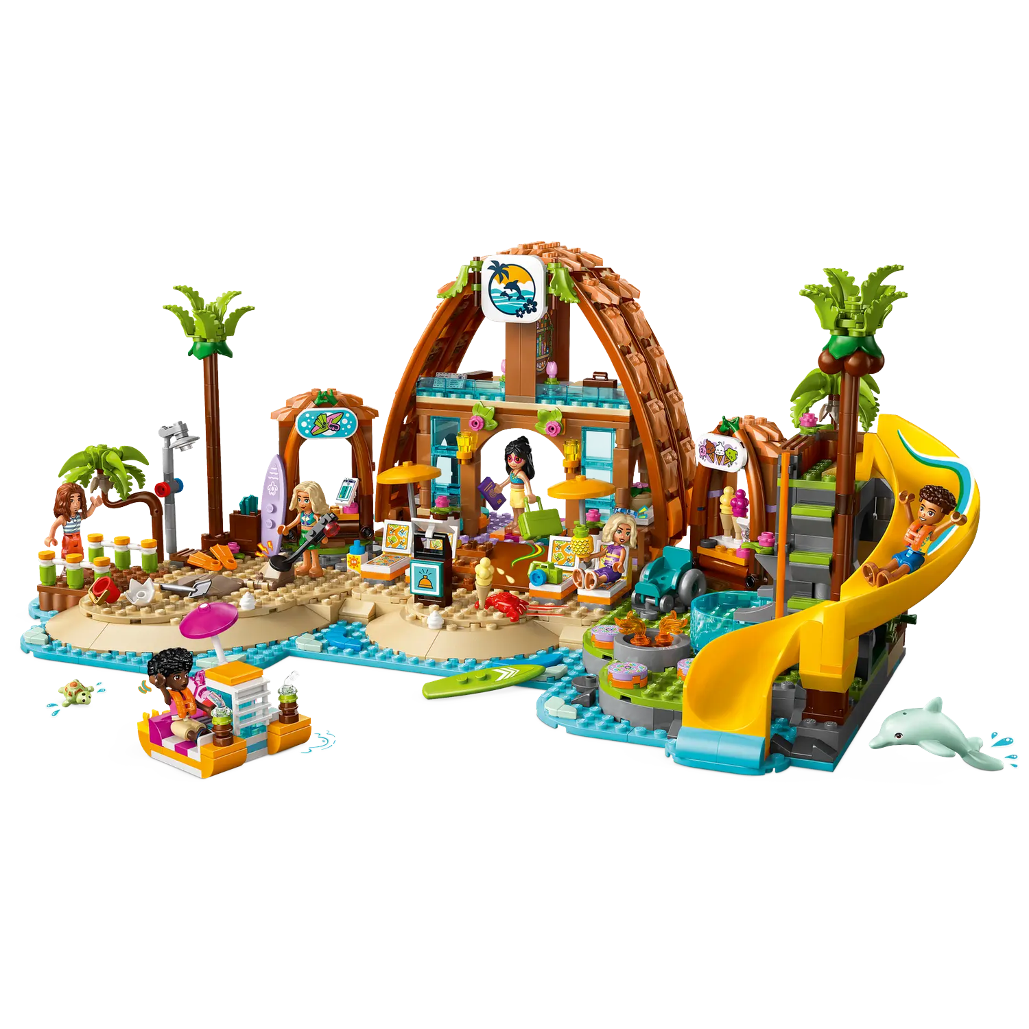 Lego beach scene with a hut, slide, boat, and several figures. Palm trees and a dolphin are also present.