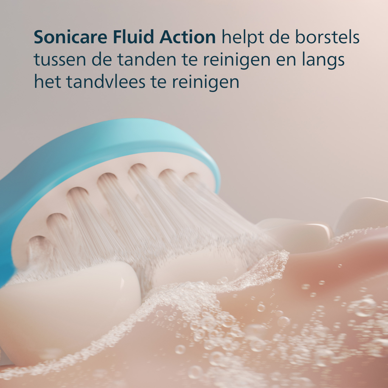 A close-up shows a toothbrush cleaning teeth. The bristles are cleaning between the teeth. Bubbles and foam are visible.