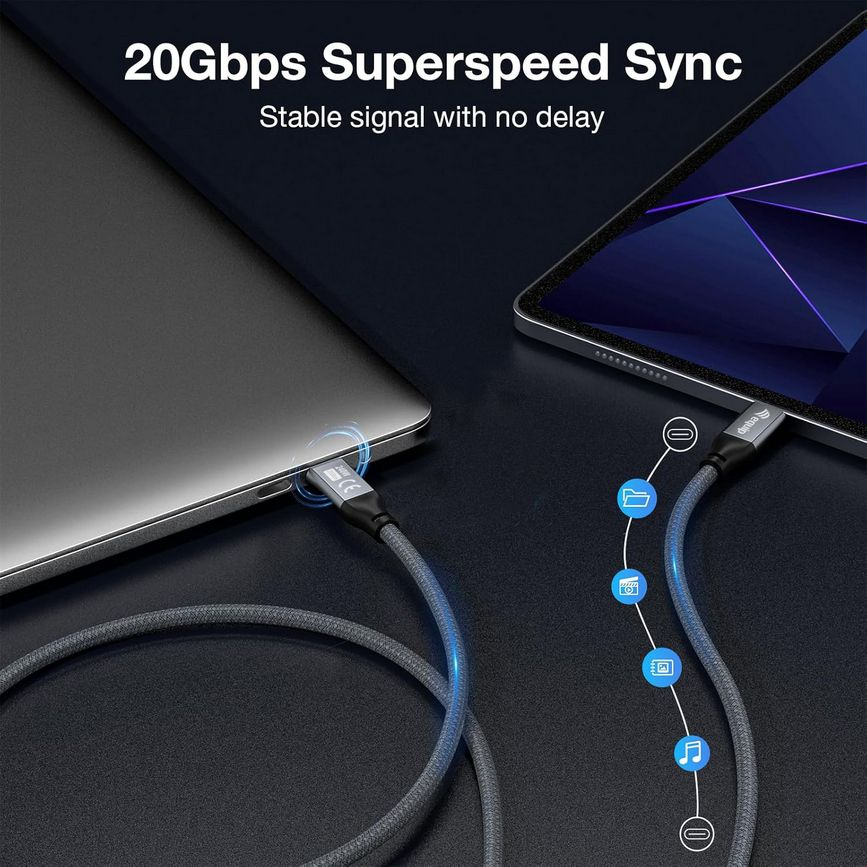 Ein Laptop und ein Tablet sind durch ein graues Kabel verbunden. Das Kabel ist an beide Geräte angeschlossen. Text: '20 Gbit/s Superspeed Sync'.