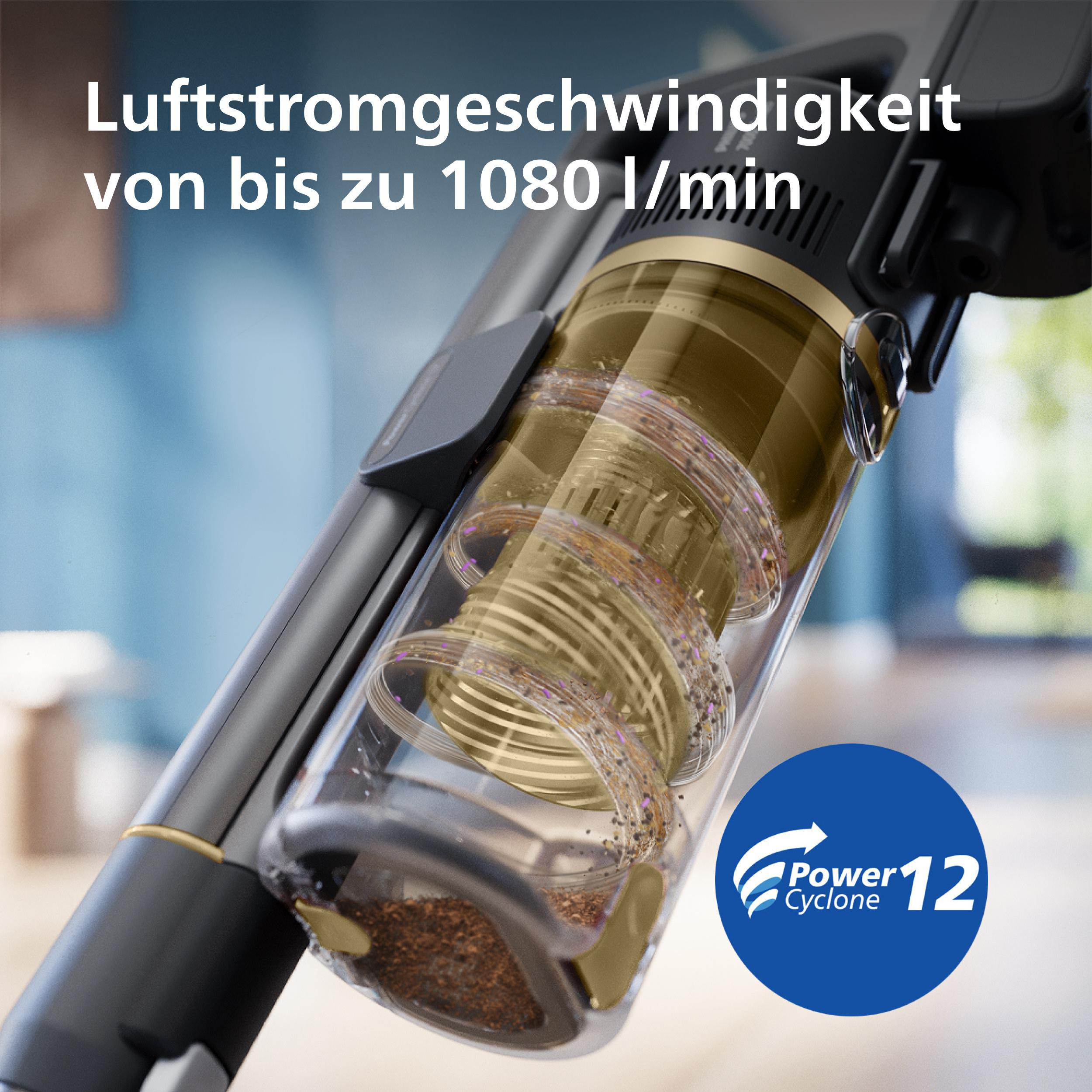 Detail des Staubsaugers mit Innenteilen und Text 'Luftstromgeschwindigkeit von bis zu 1080 l/min' und blauem Power Cyclone 12 Logo.
