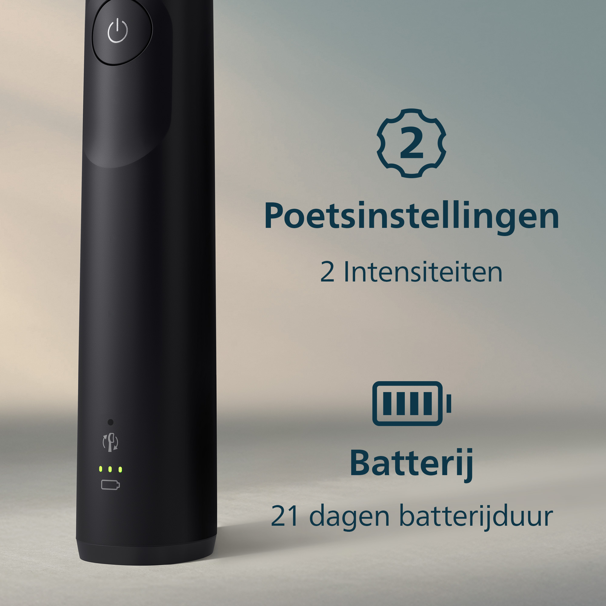 Zwarte elektrische tandenborstel met aan/uit-knop en batterij-indicator. Tekst toont instellingen, intensiteiten, batterij en 21 dagen batterijduur.