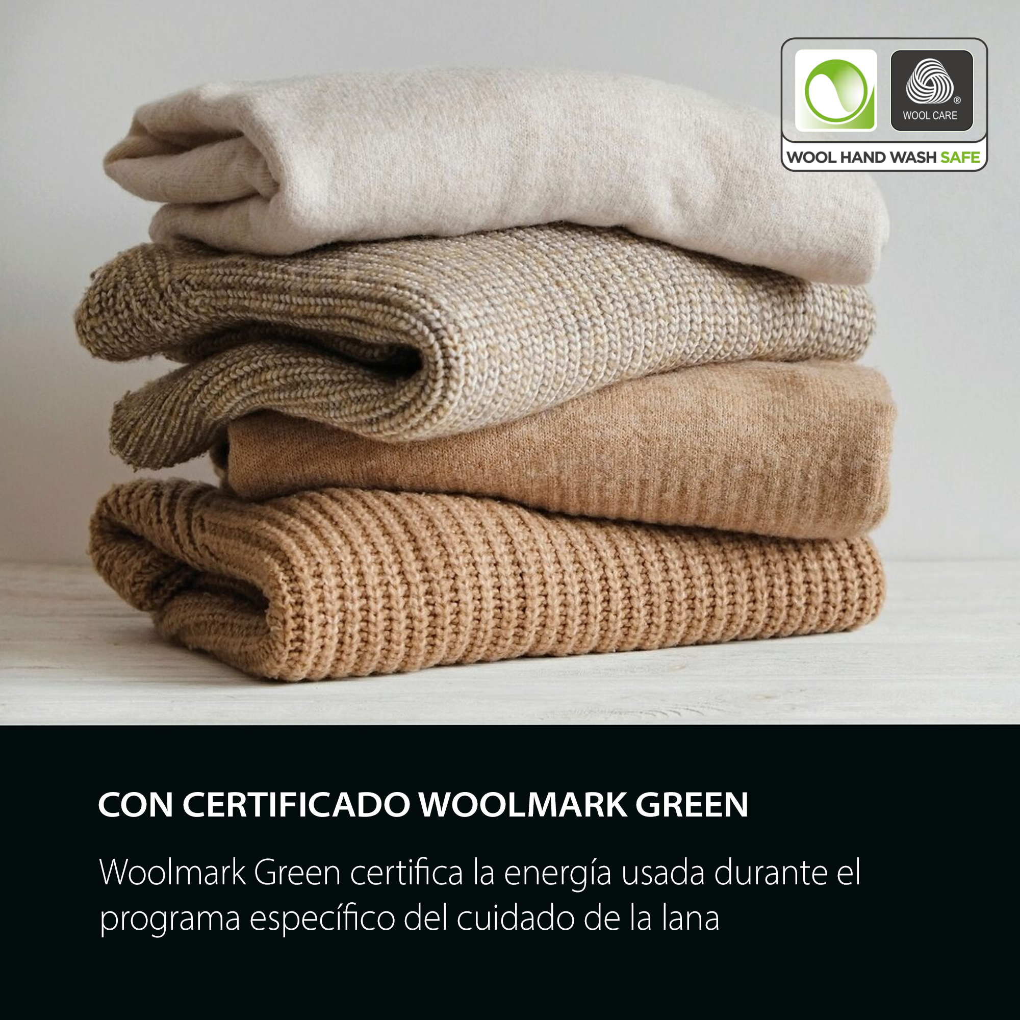 Pila de suéteres doblados en tonos beige y marrón, con el logo y texto de Woolmark.