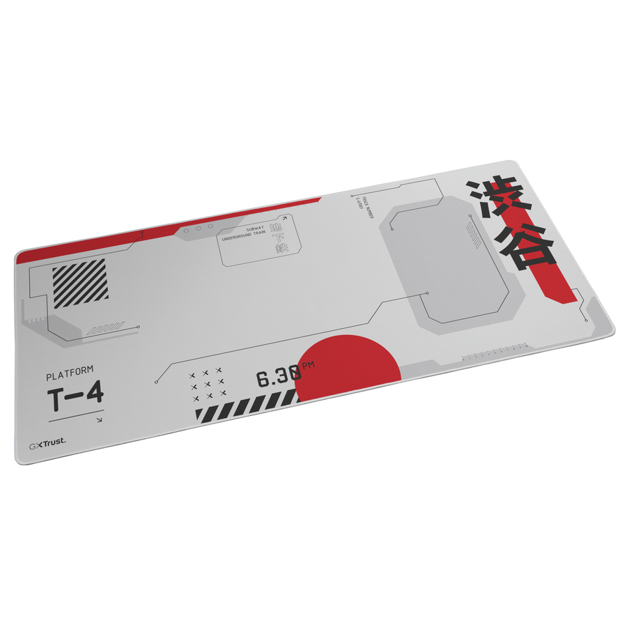 Una alfombrilla de ratón gris y roja con texto japonés, un círculo rojo y la hora 6.38 PM. La marca es GXTrust.