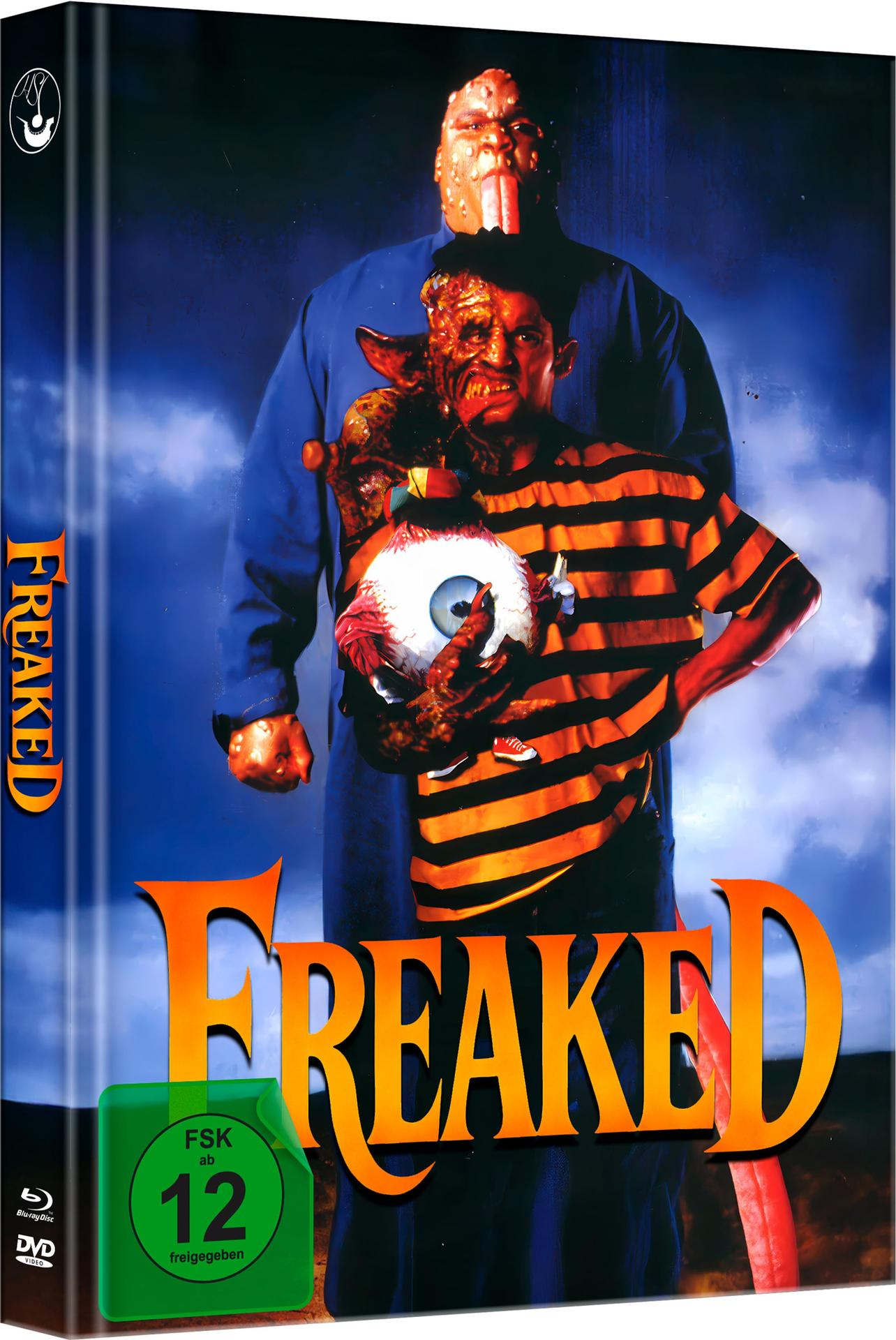 DVD-Cover für 'Freaked'. Ein Mann hält ein riesiges Auge, während eine größere Figur droht. Oranger Titeltext mit FSK 12-Rating.