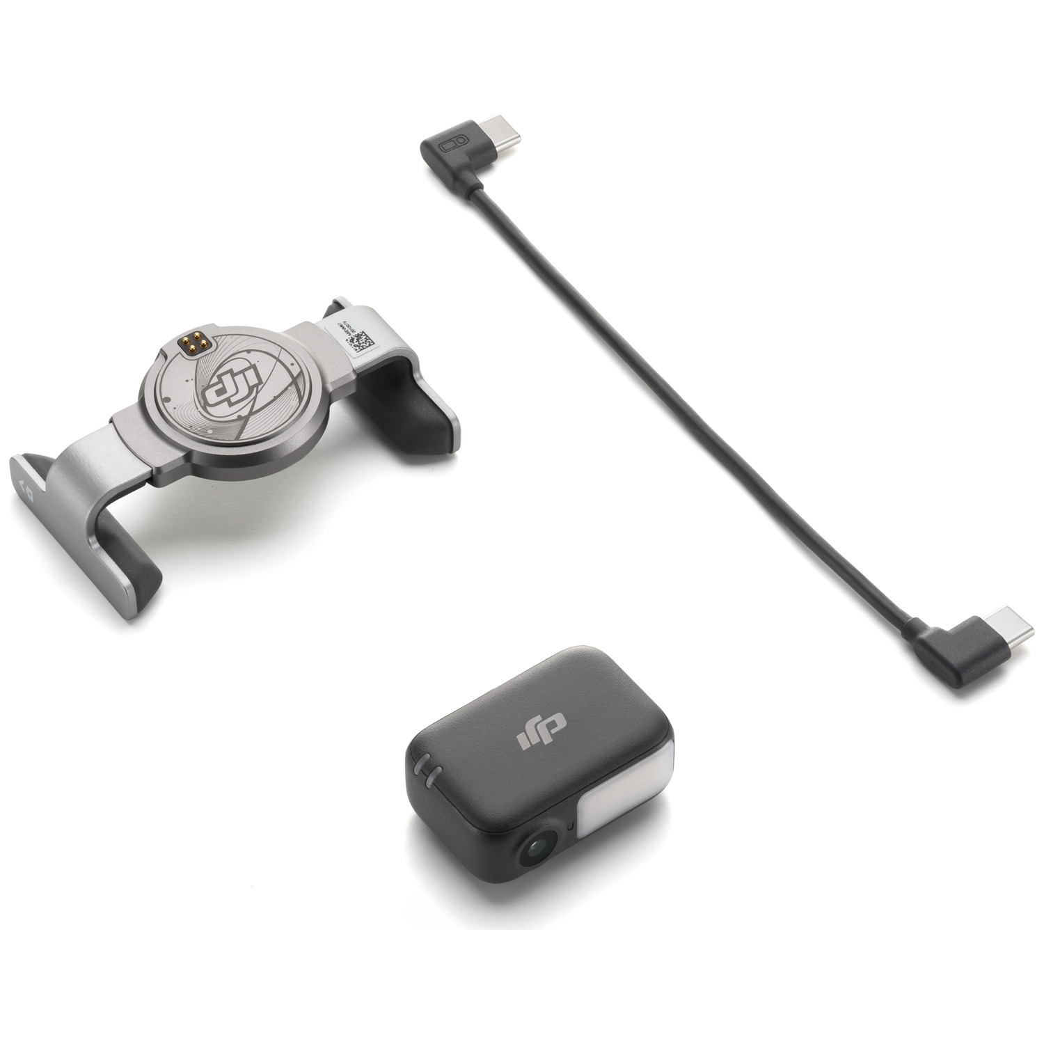 Three tech accessories on white: a silver device, a black cable, and a black camera with a white light.
