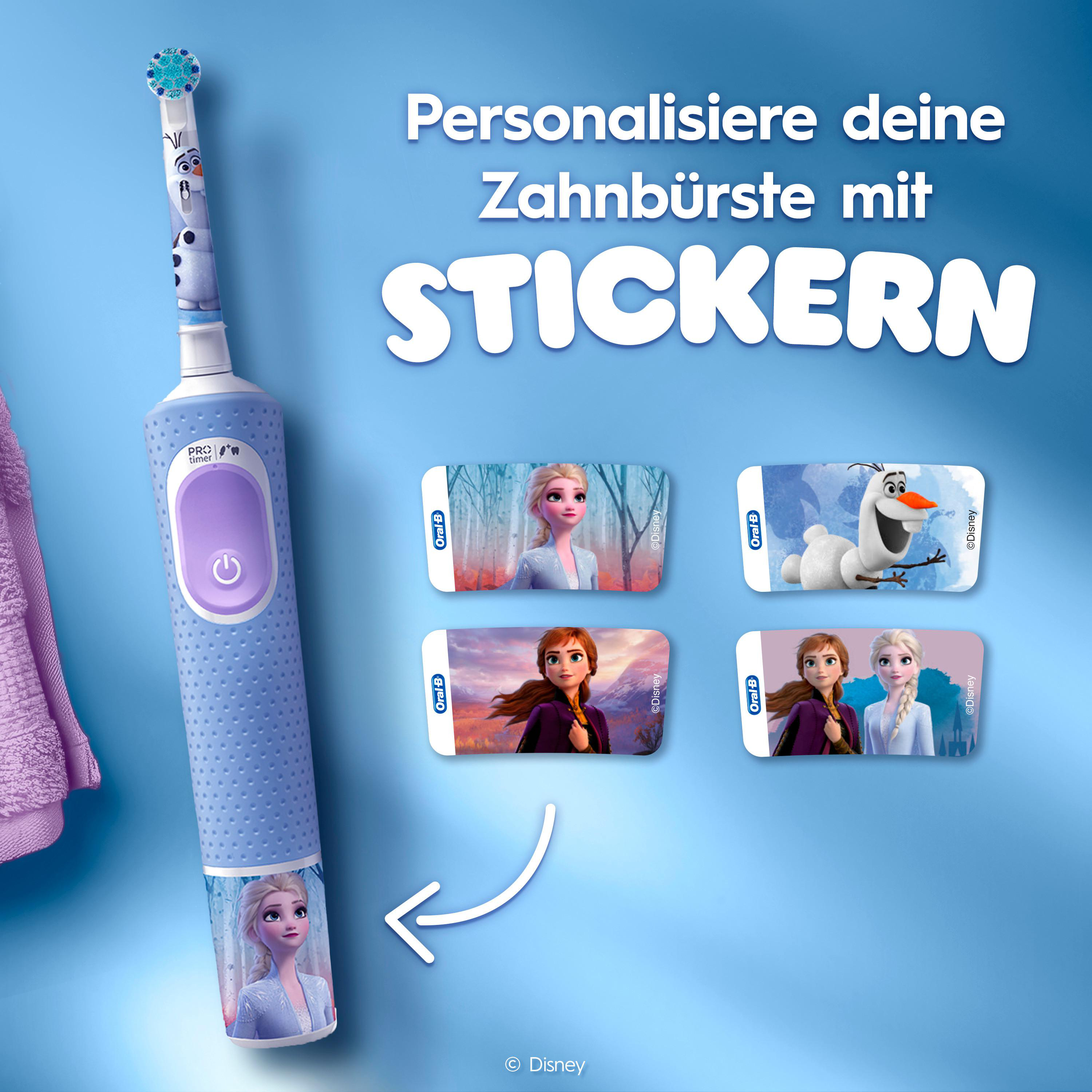 Eine elektrische Zahnbürste mit Frozen-Aufklebern, zusätzlichen Aufkleberdesigns und einem lila Tuch.