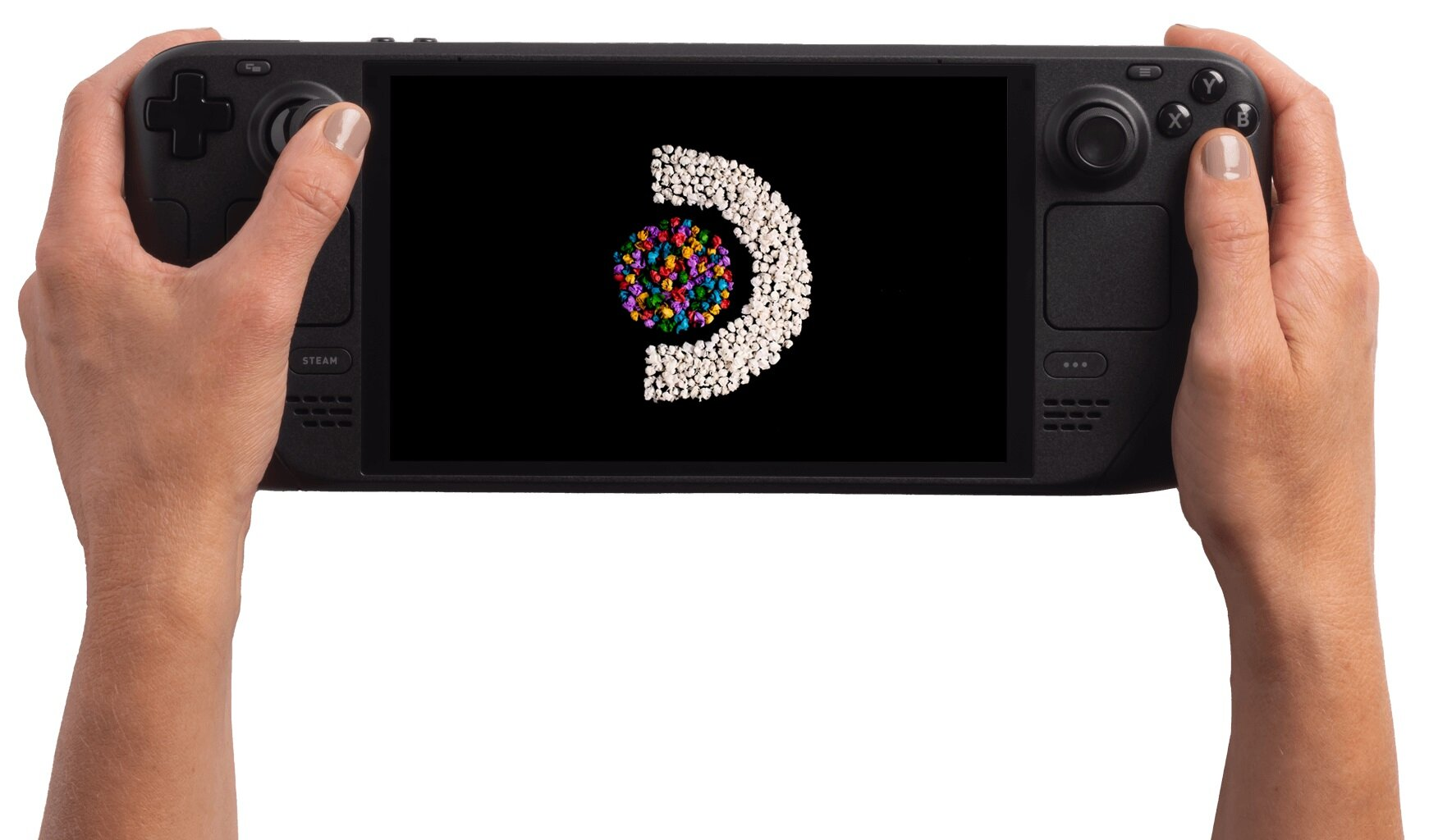Ręce trzymające czarne przenośne urządzenie do gier. Ekran wyświetla logo z kolorowymi kształtami i białymi kropkami na czarnym tle.
