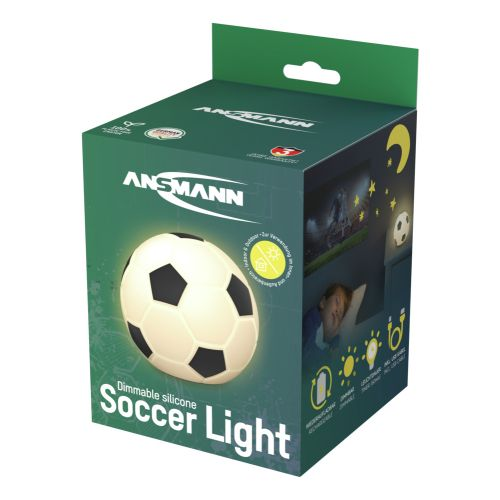 Schachtel mit einem Fußballlicht. Es ist ein dimmbares Silikonlicht in Form eines Fußballs. Die Schachtel ist grün mit einem schlafenden Kind.