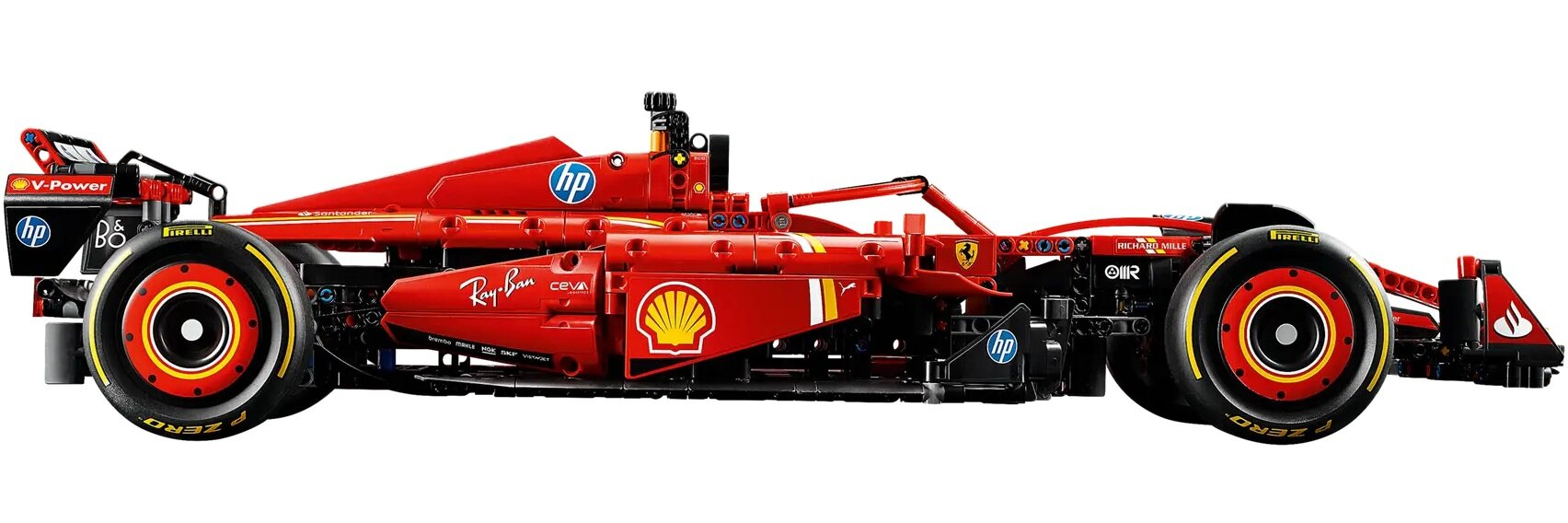 Czerwony model Ferrari F1 z czarnymi oponami, logo sponsorów i białym tłem.