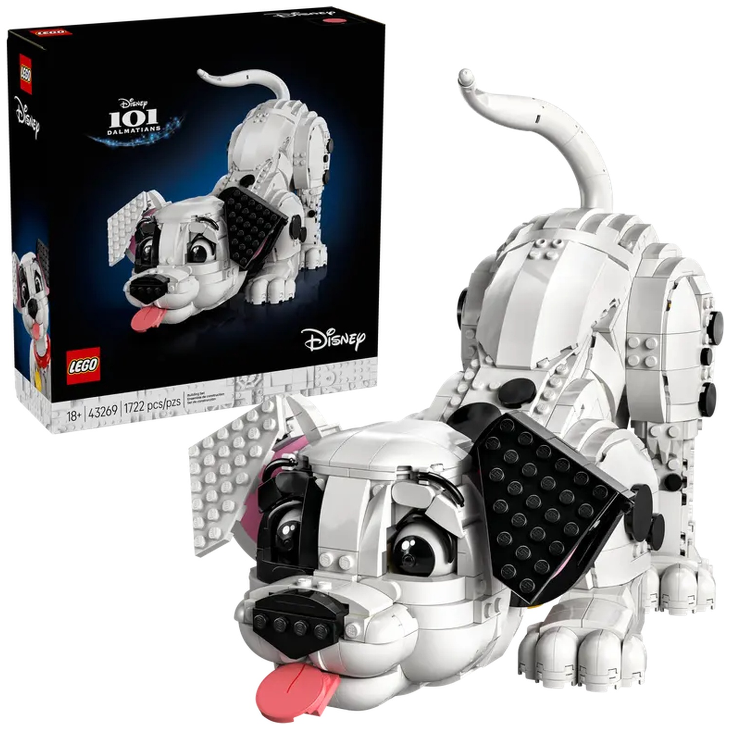 Een Lego Dalmatische model, wit met zwarte vlekken. Het heeft een roze tong. De doos staat op de achtergrond.