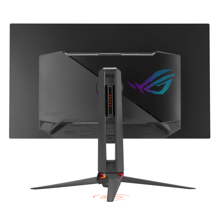 La parte trasera de un monitor de computadora negro. Tiene un soporte con tres patas. El logotipo de ROG es visible. El monitor está sobre una superficie negra.