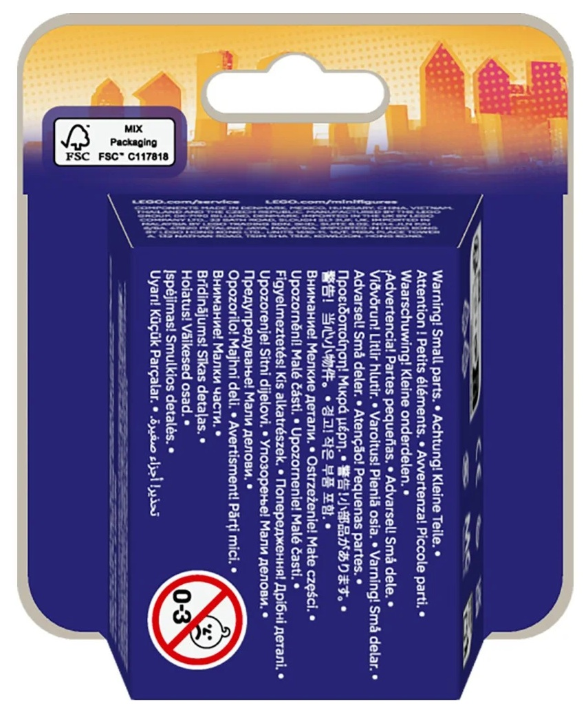 Tył niebieskiego pudełka Lego z ostrzeżeniami w wielu językach i symbolem wieku 0-3.