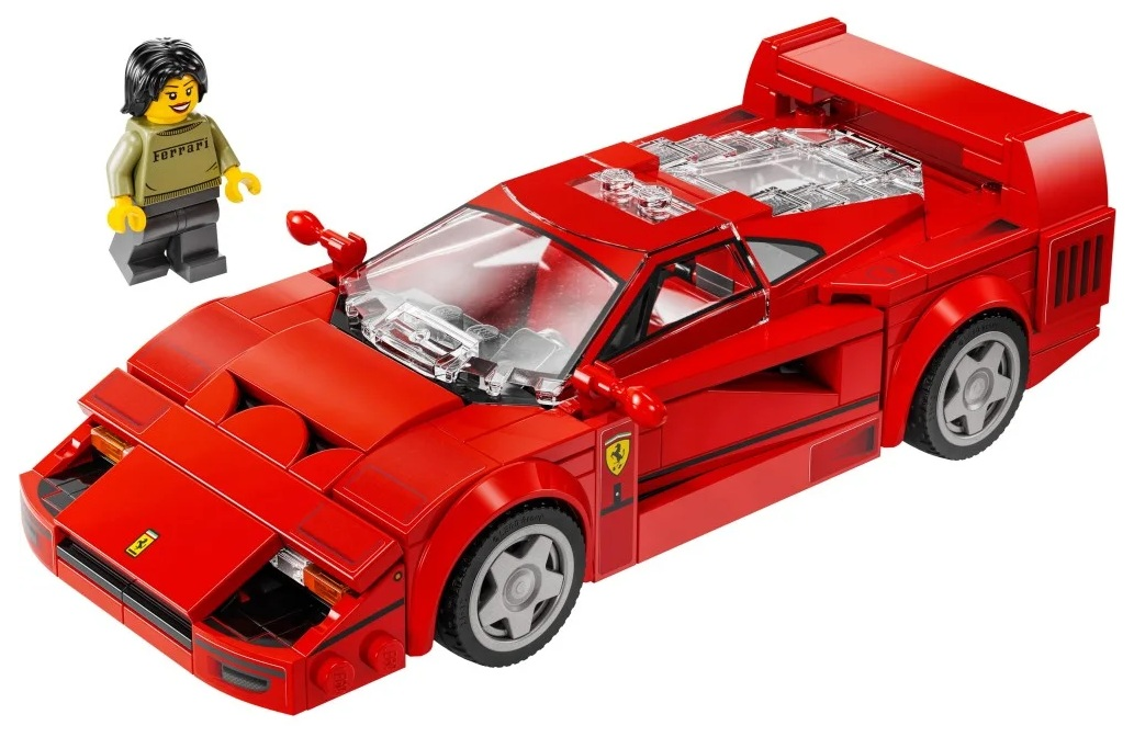 Model Lego Ferrari F40, czerwony, z figurką Lego. Samochód jest szczegółowy. Figurka jest żeńska i stoi obok samochodu.