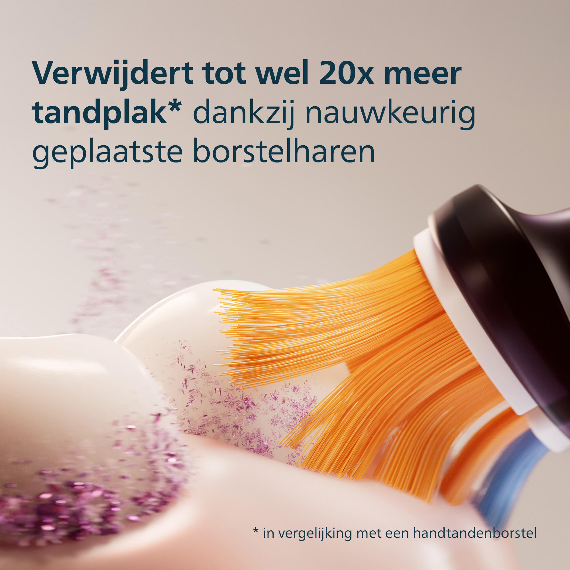 Close-up of a toothbrush with orange bristles and toothpaste. Text reads: Removes up to 20x more plaque.