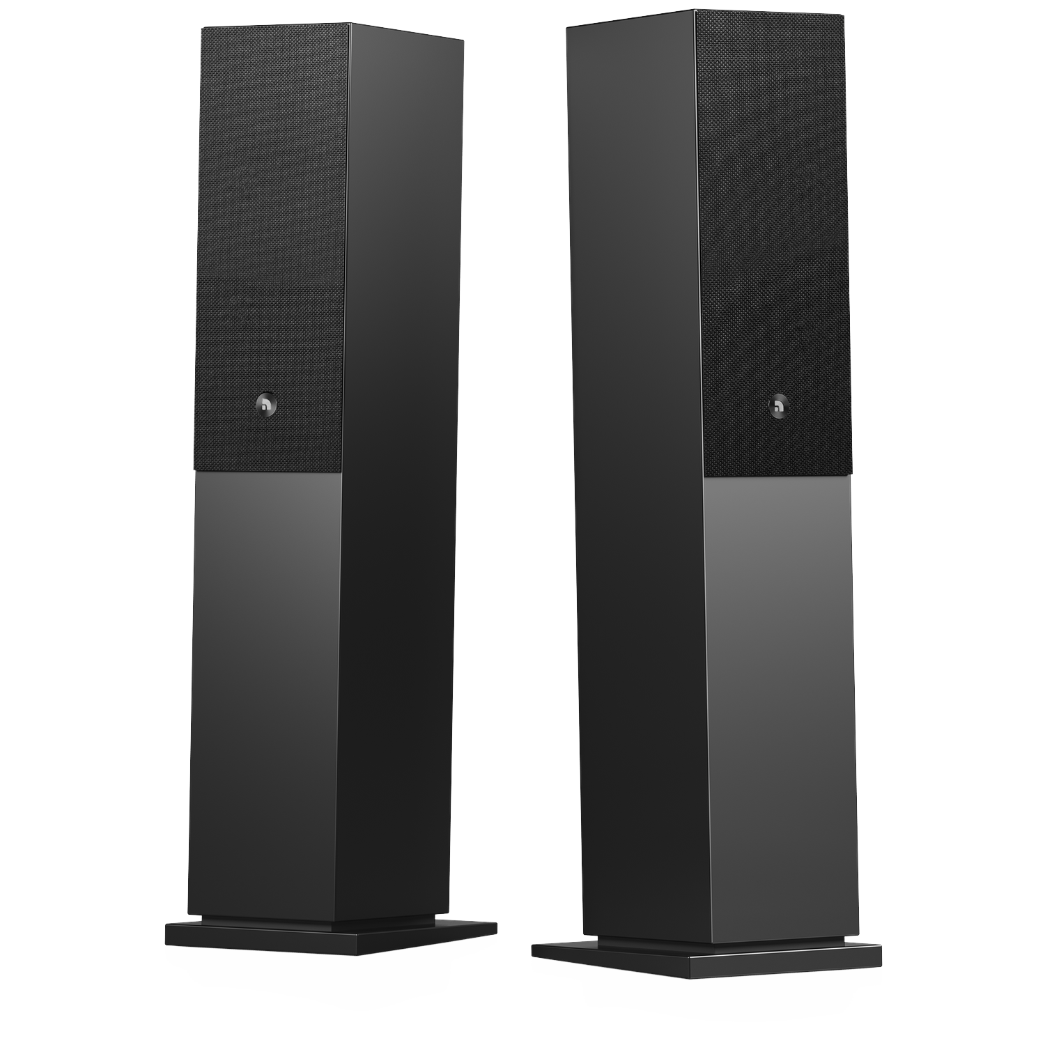 Two tall, black speakers stand against a white background. Each has a textured upper section and a smooth lower part.