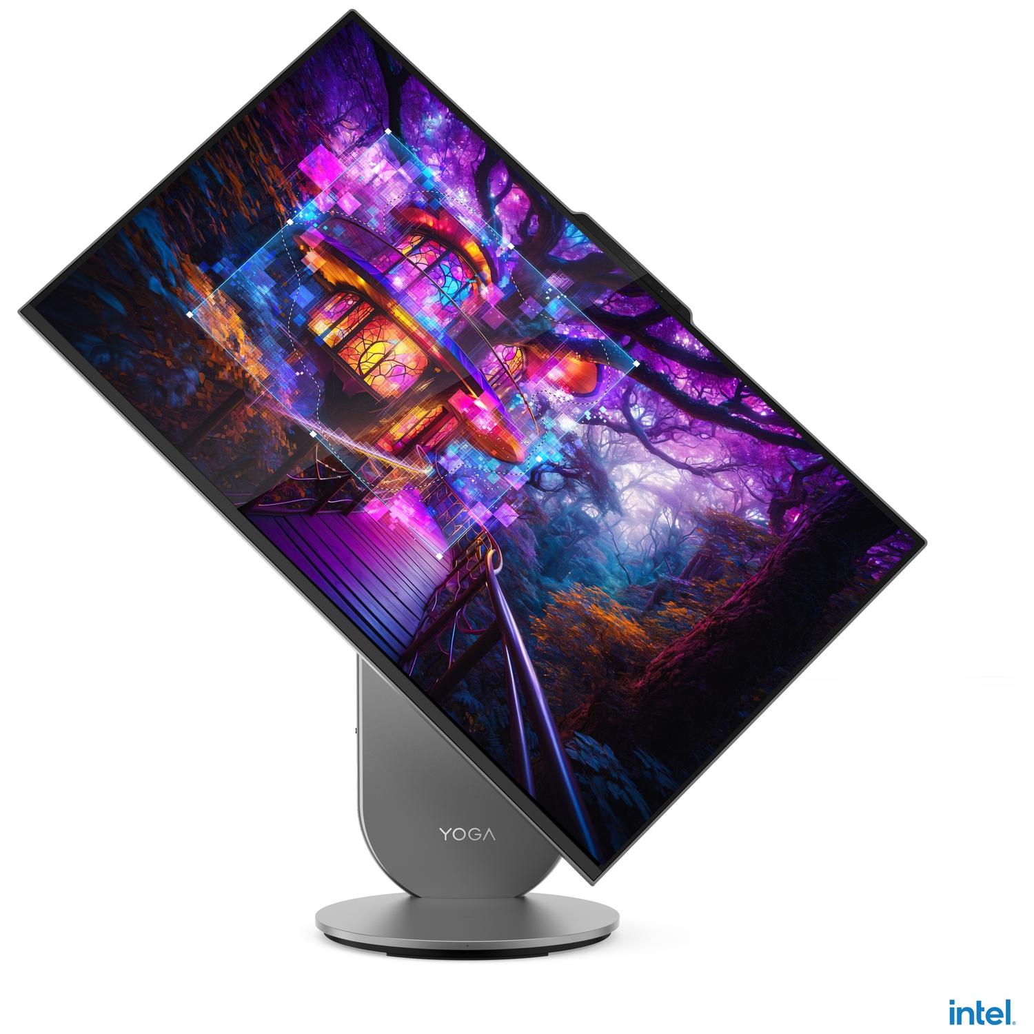 A Lenovo Yoga monitor displays a colorful forest scene. The monitor is gray, with the word 'YOGA' on its base, and sits on a white surface.