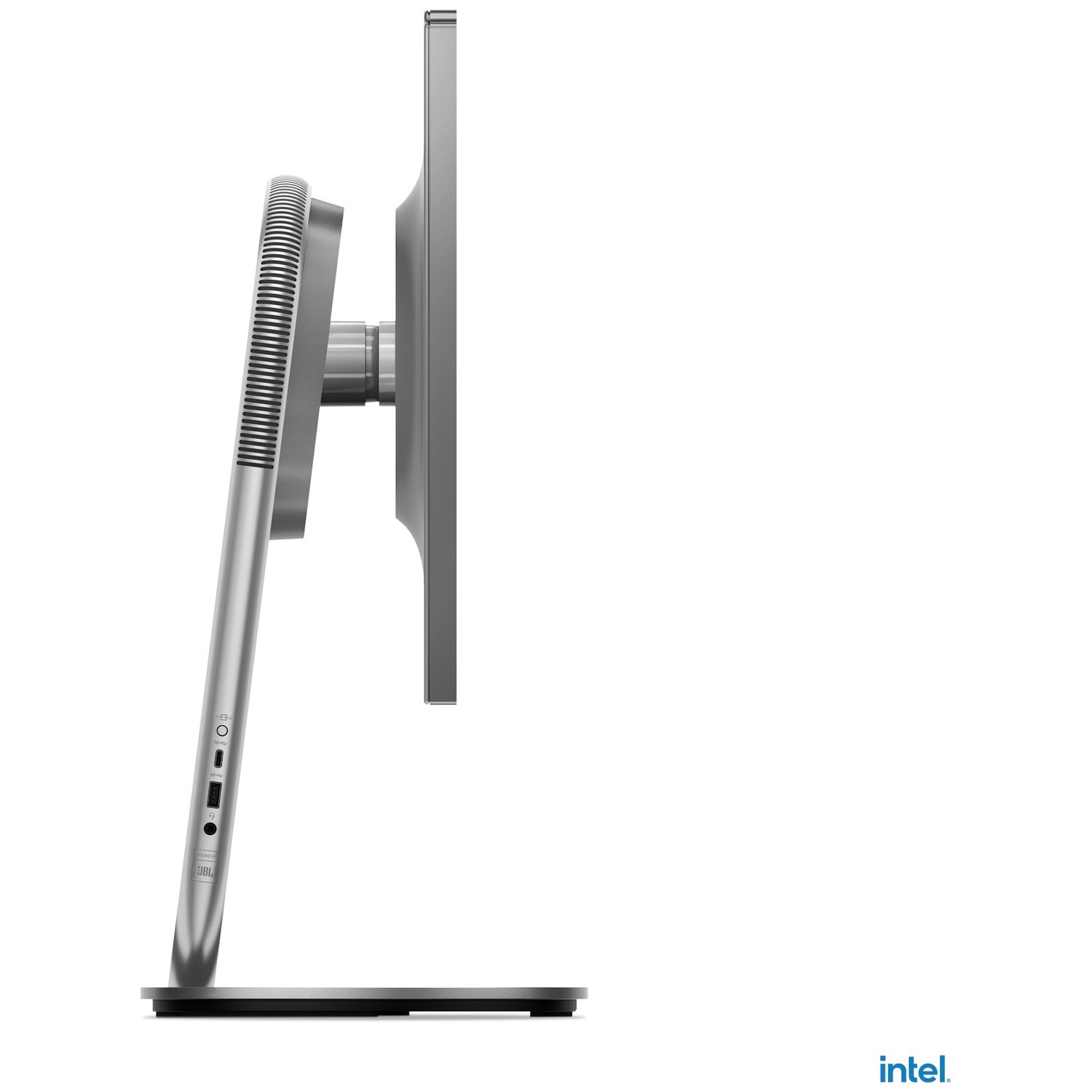 Side view of a silver computer monitor. It has a slim design with a JBL speaker and ports. The background is white.
