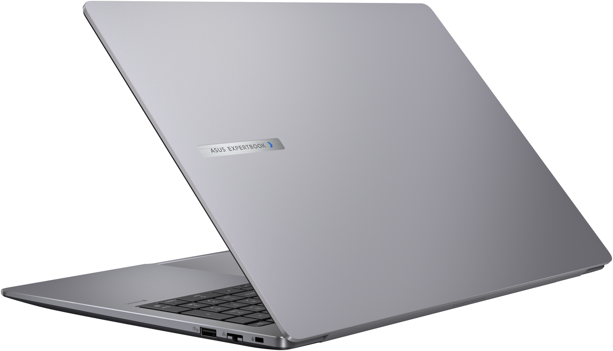 Ein silbernes Asus Expertbook-Laptop ist geöffnet. Die Tastatur ist sichtbar. Der Hintergrund ist schwarz.