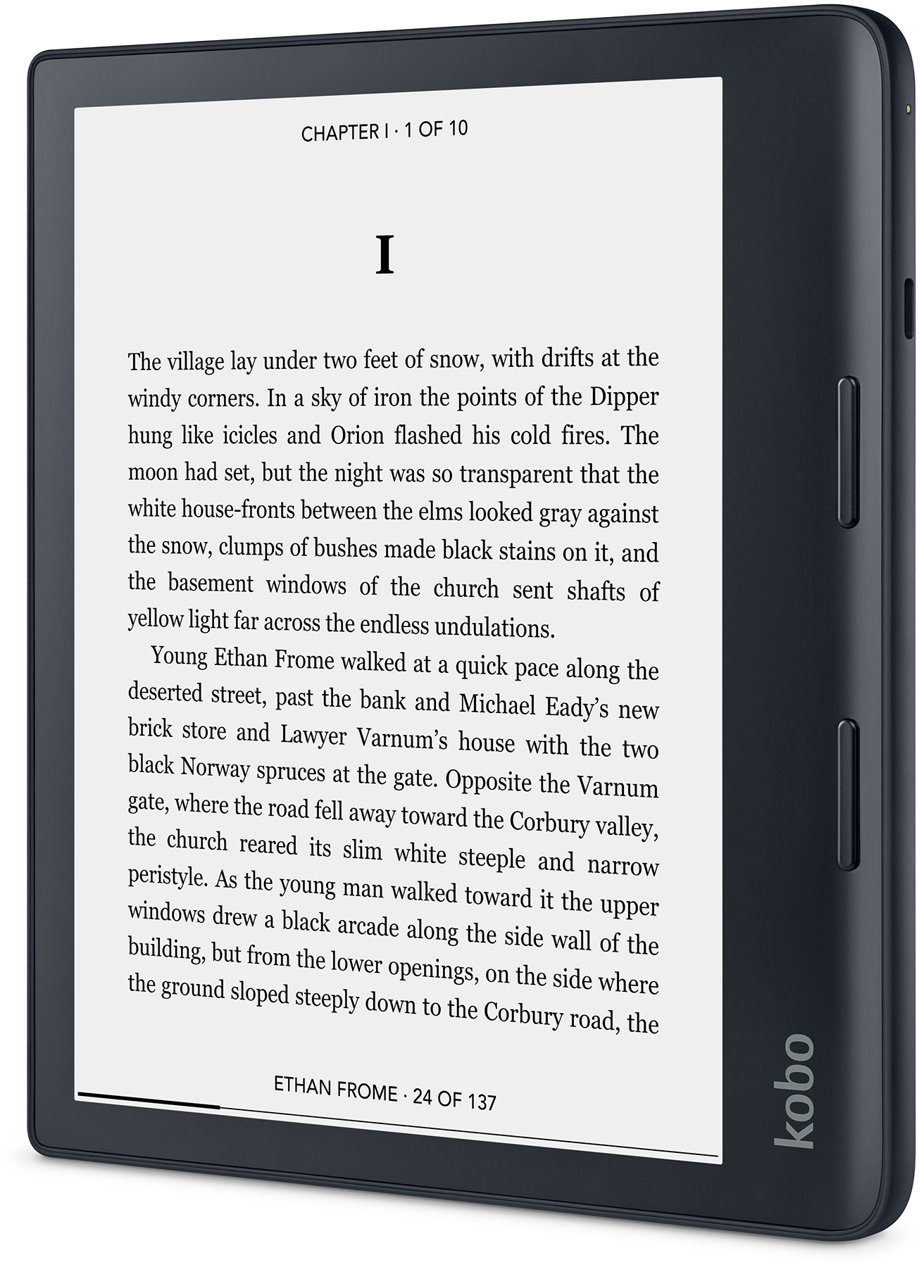Egy ebook olvasó szöveget jelenít meg. A készülék fekete, fehér képernyővel. A képernyő egy könyv egy fejezetét jeleníti meg.