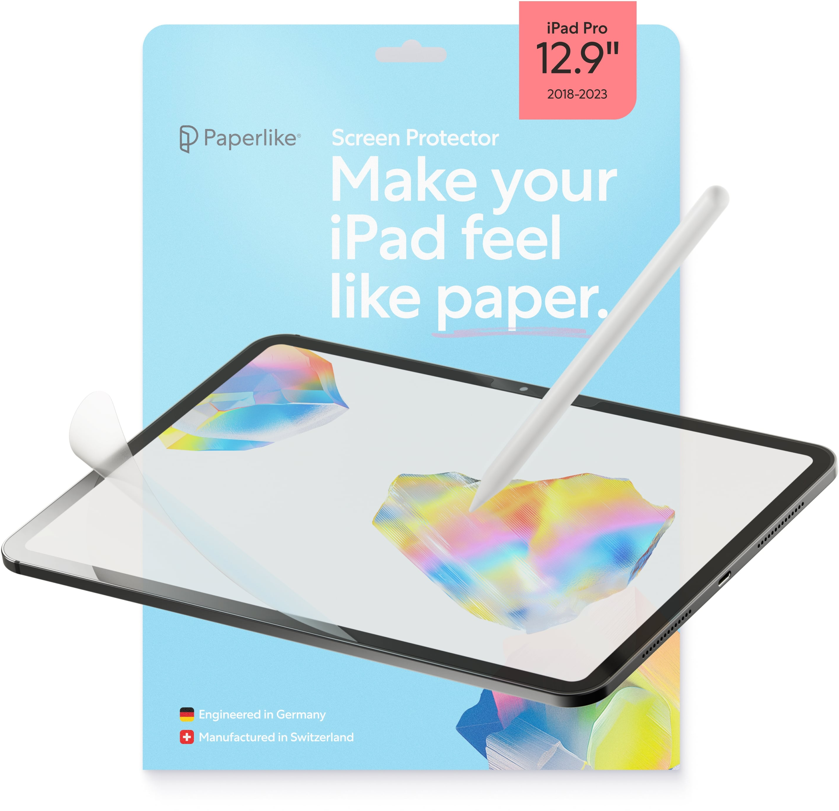 Un iPad con protezione schermo e stilo. Lo sfondo è una confezione blu con testo.