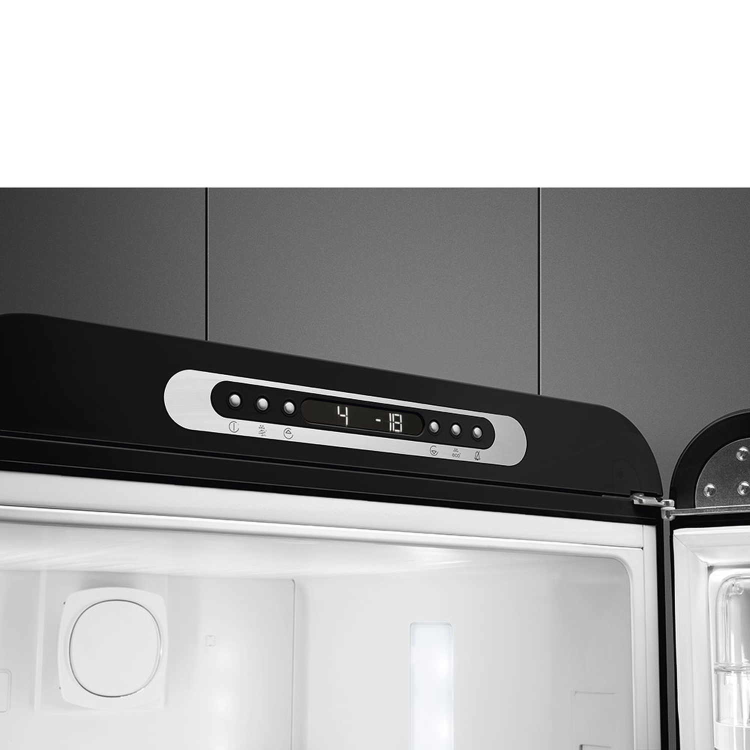 Open refrigerator with digital display showing 4 and -18. Interior is white with a round object on the left. The door is black.