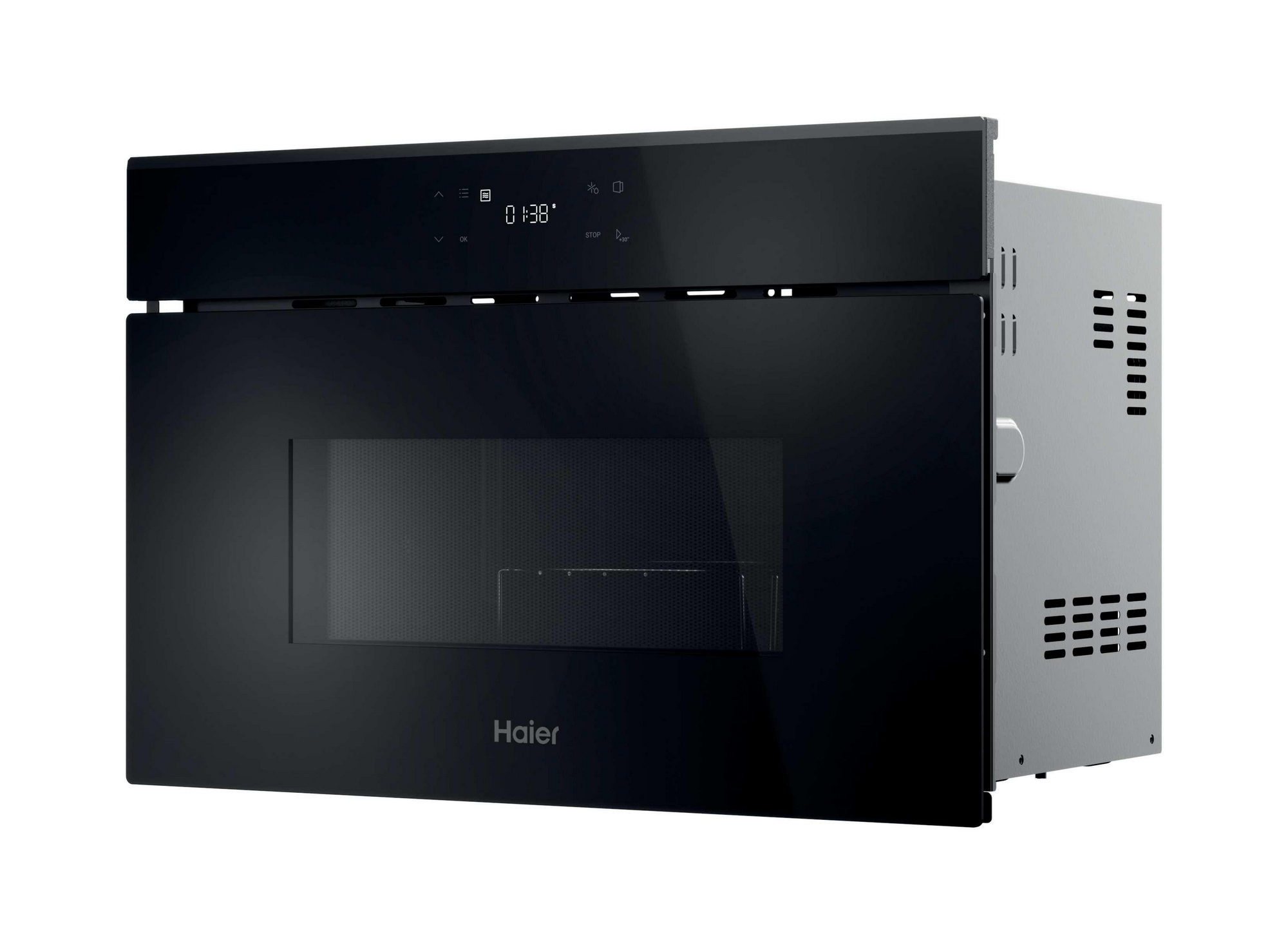Microondas negro con pantalla digital que muestra 01:38. El logo de Haier está abajo. El lado derecho es plateado.