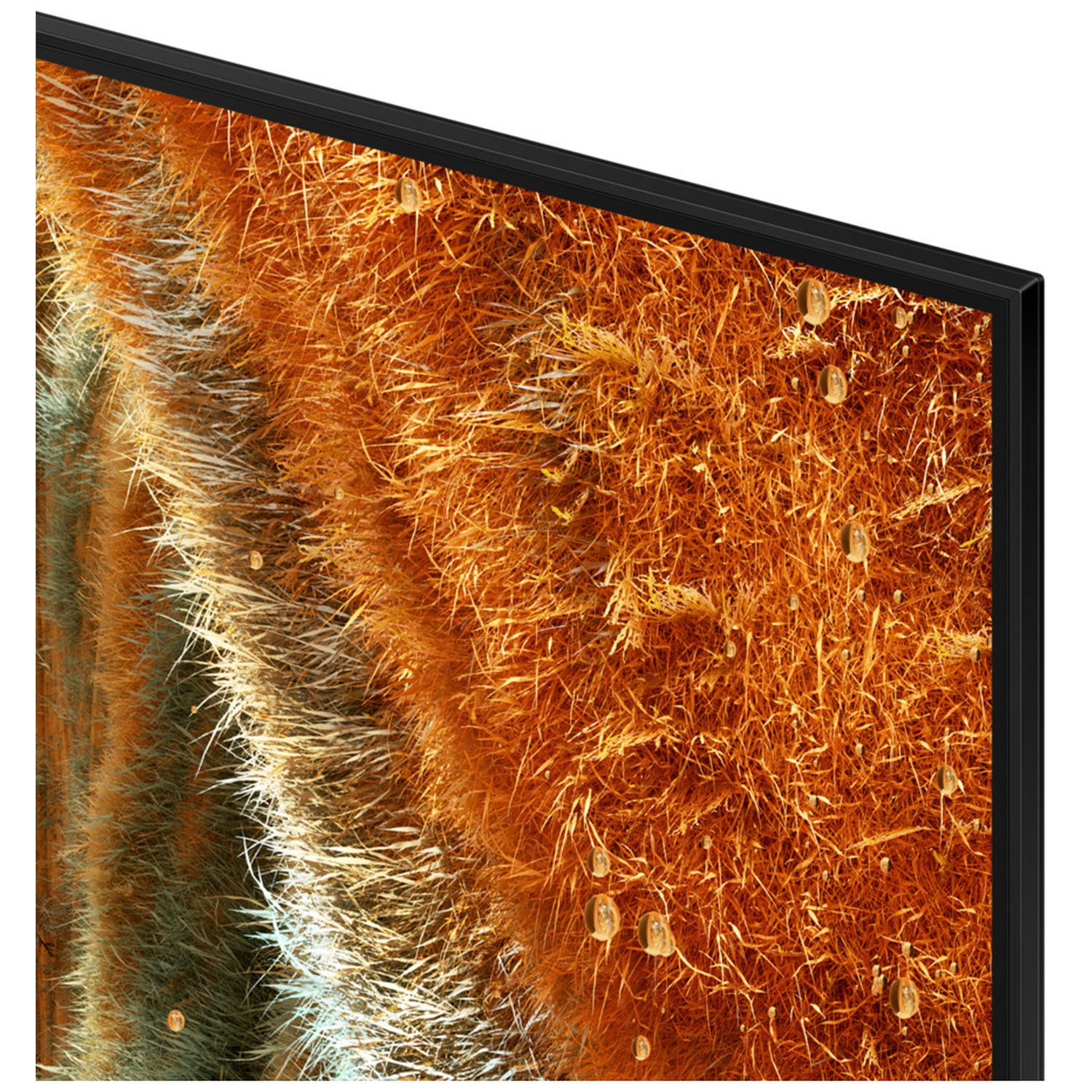 Close-up van een scherm met een abstract patroon van oranje en groene texturen, met een zwart frame.