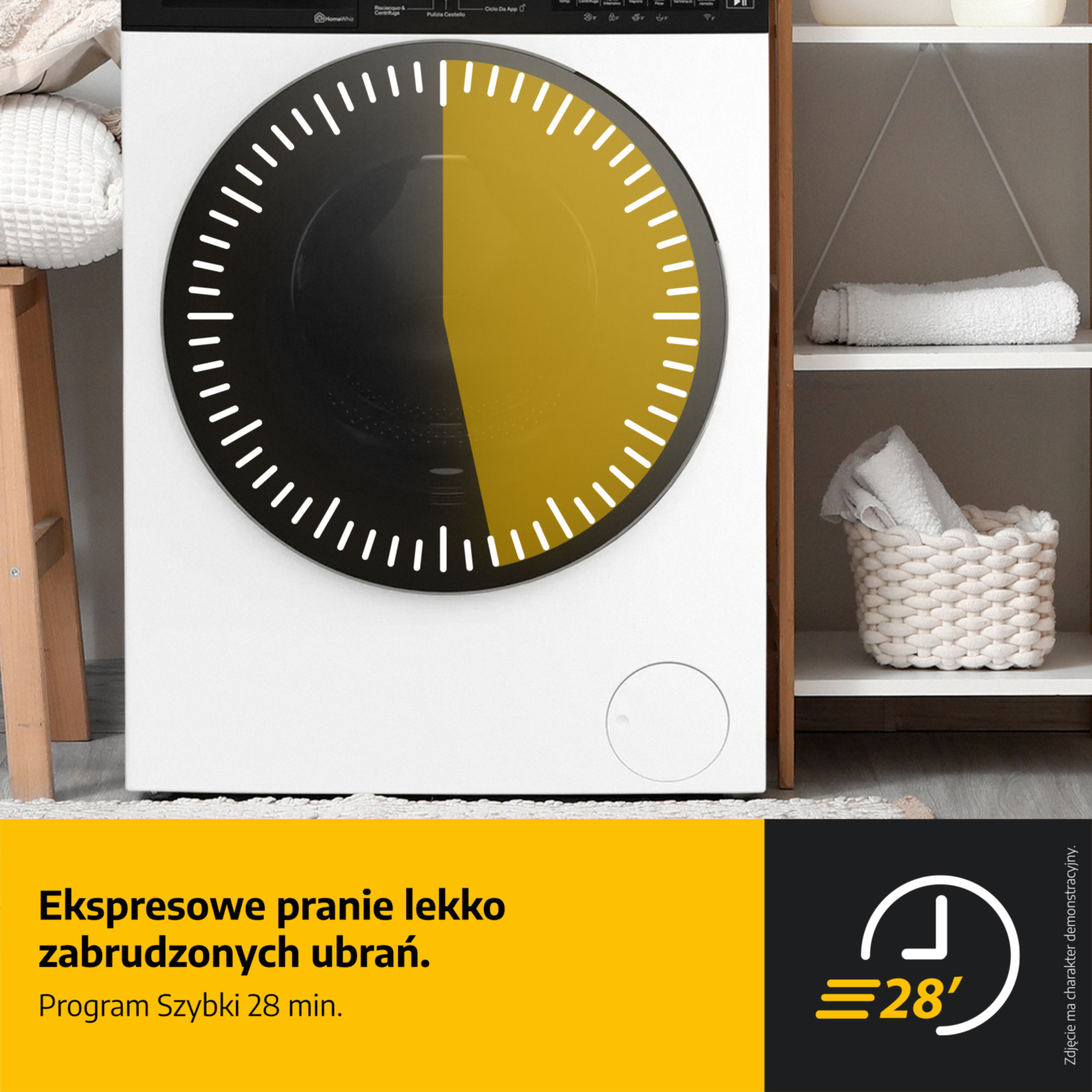 Pralka z timerem na 28 minut. Ręczniki w tle. Tekst na dole pokazuje cykl prania.