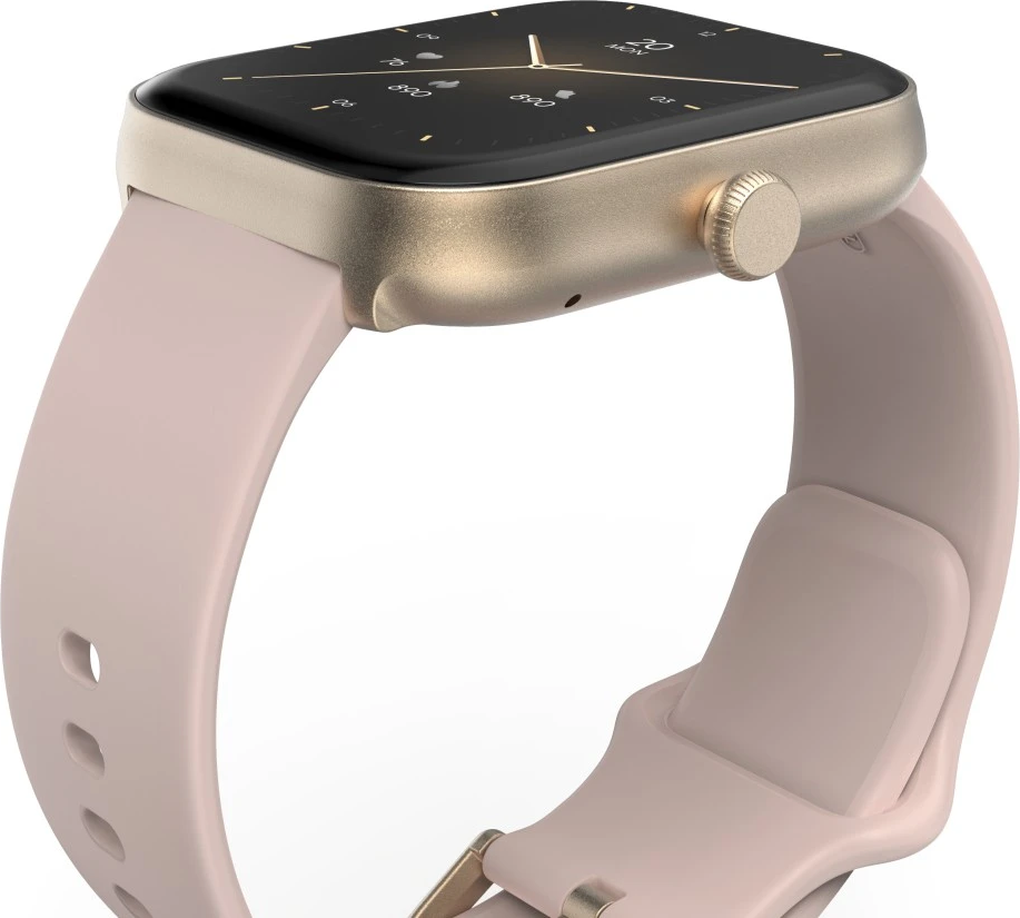 Gros plan d'une montre connectée avec un boîtier doré et un bracelet rose clair. Le cadran est noir avec des marquages blancs.