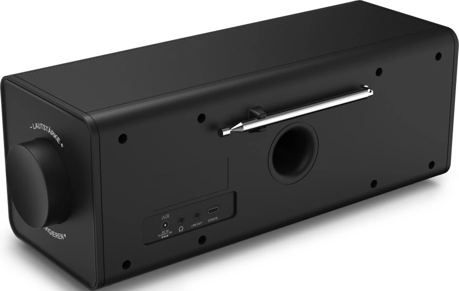 Radio noire avec bouton de volume, antenne et haut-parleur. Il possède divers ports d'entrée/sortie. Le design est élégant et moderne.