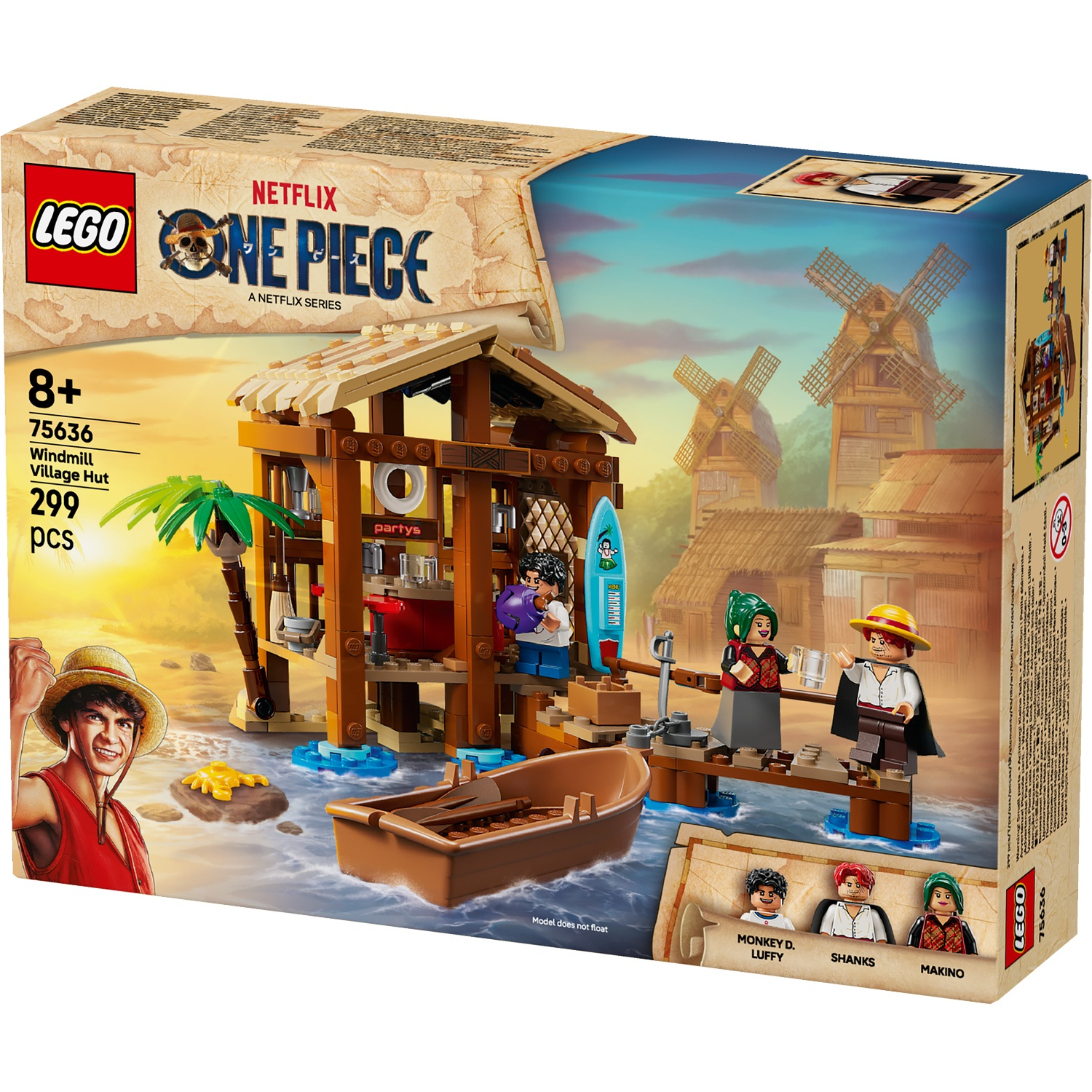 Lego-setdoos. Toont een Windmill Village Hut-set met personages, een boot en een surfplank. Inclusief Lego-figuren en windmolens op de achtergrond.