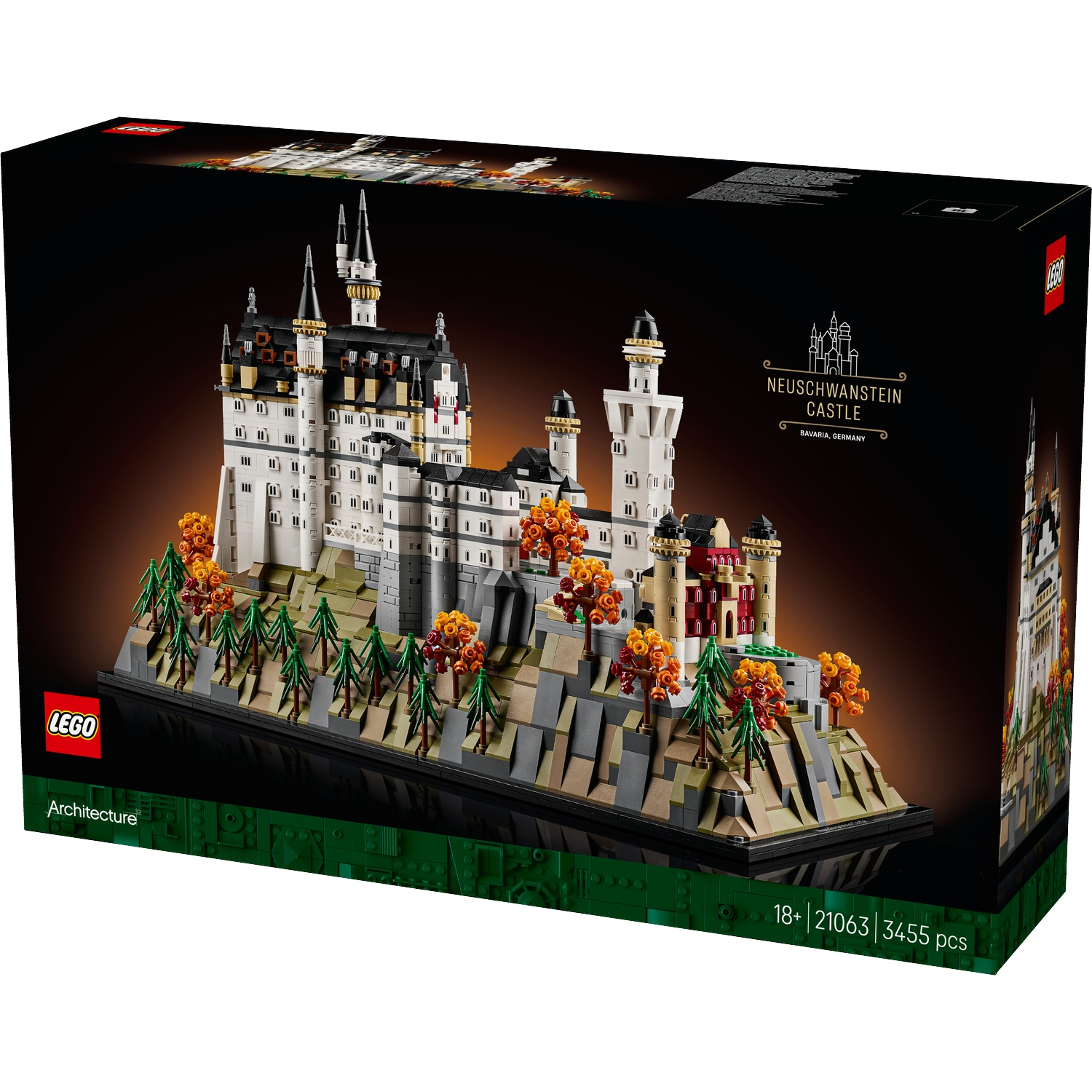 A Lego box set of Neuschwanstein Castle. It includes a model of the castle, trees, and landscape, set against a black background.