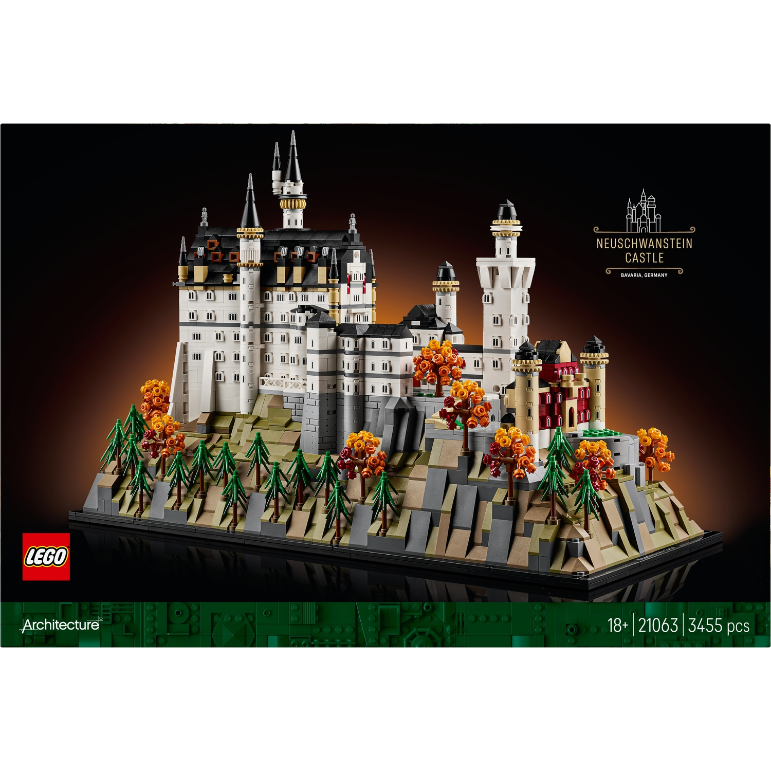 A Lego model of Neuschwanstein Castle, on a dark background. The castle is white with black roofs, surrounded by trees and rocks.