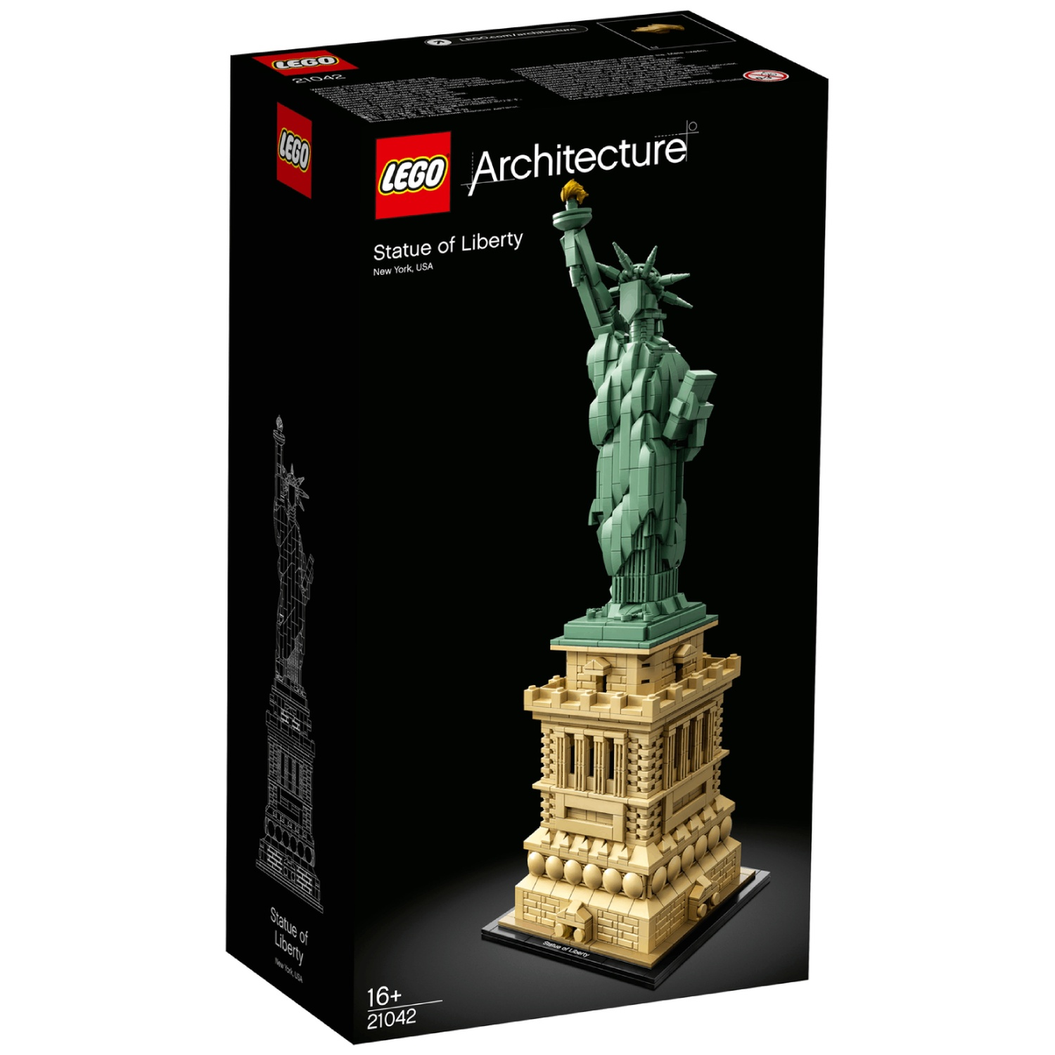 Un coffret Lego représentant la Statue de la Liberté. Le modèle est vert et beige, sur une base noire. La boîte est noire.