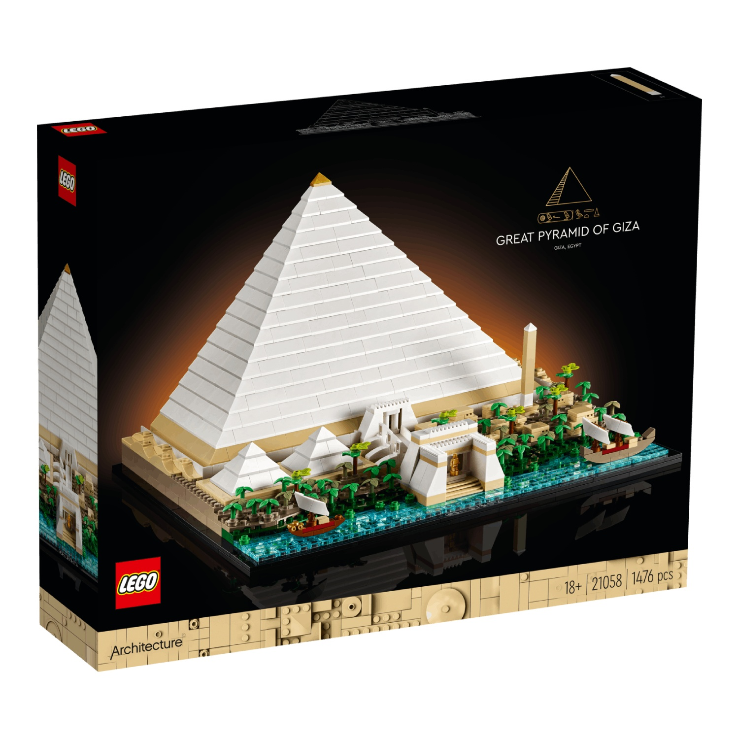 Een Lego-doos toont de Grote Piramide van Gizeh. Het toont de piramide, kleinere piramides, water, bomen en het Lego-logo.