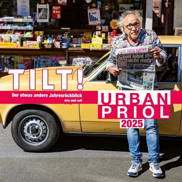 Ein Mann steht neben einem gelben Auto und hält eine Zeitung. Schlagzeilen lauten 'Arbeit lohnt sich nicht mehr'. Hintergrund ist ein Kiosk.