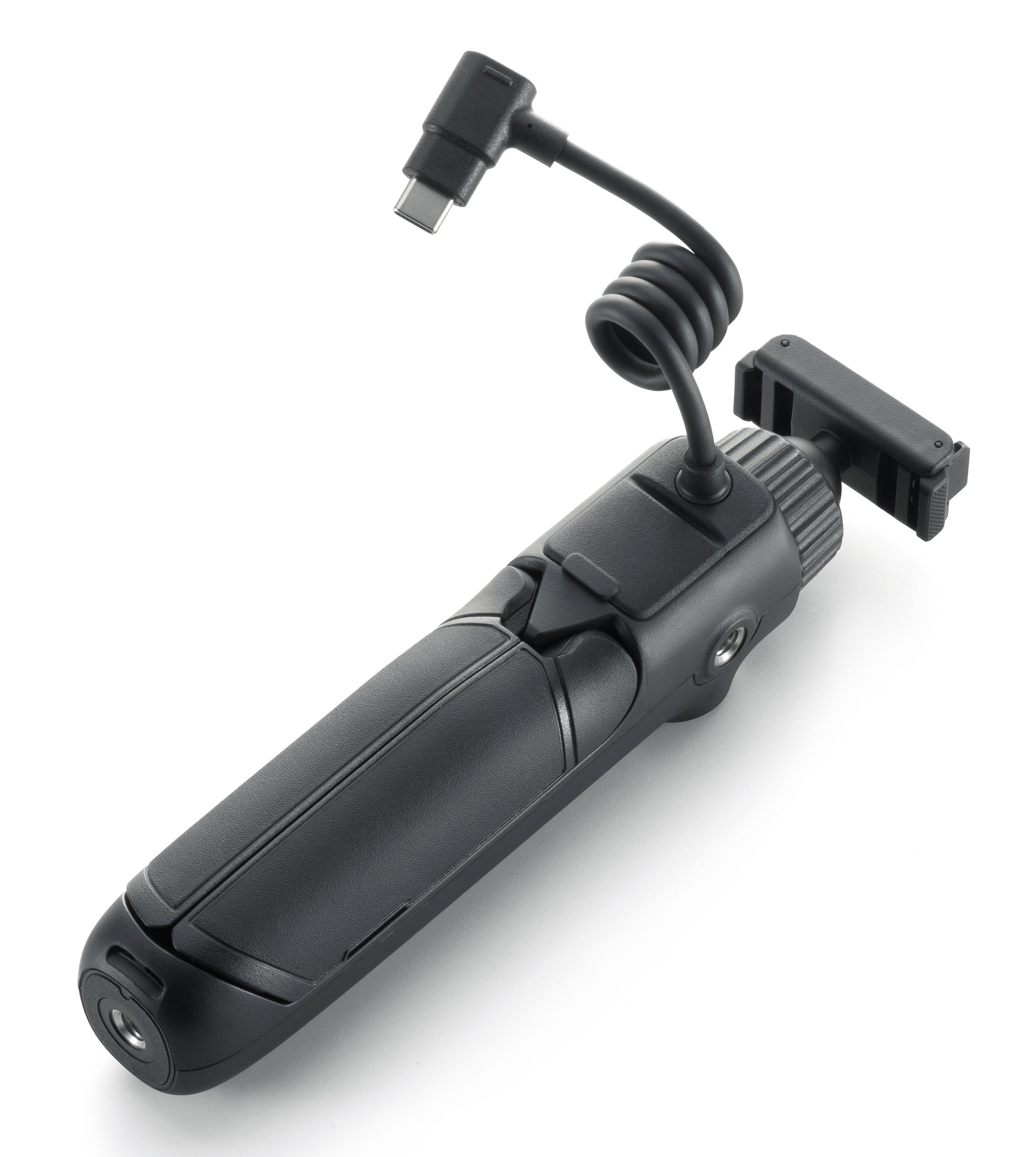 Czarny statyw do aparatu z kablem USB-C. Leży na białej powierzchni.
