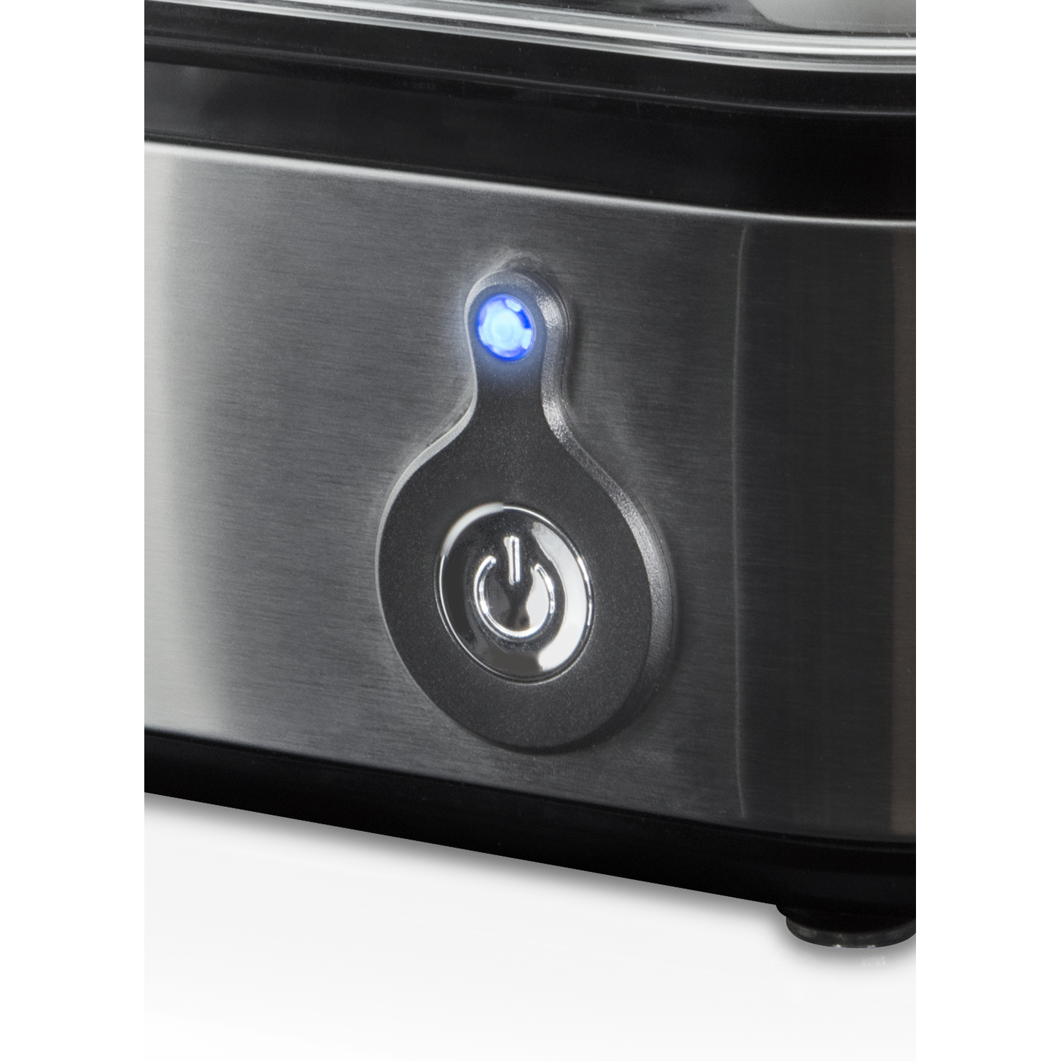 Close-up of a stainless steel appliance with a power button. A blue light indicates power. The button is black with a power symbol.