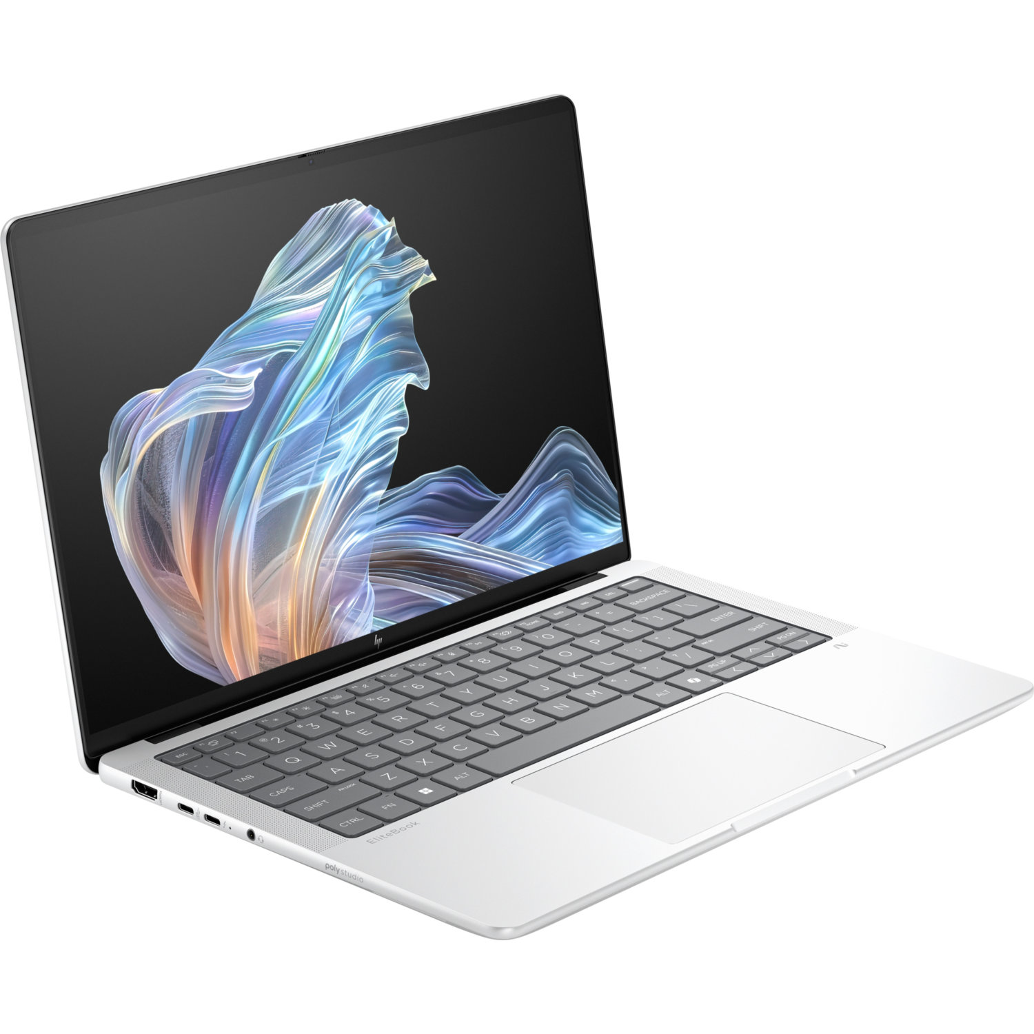 A silver laptop is open, displaying a colorful abstract image on the screen. The keyboard and touchpad are visible.