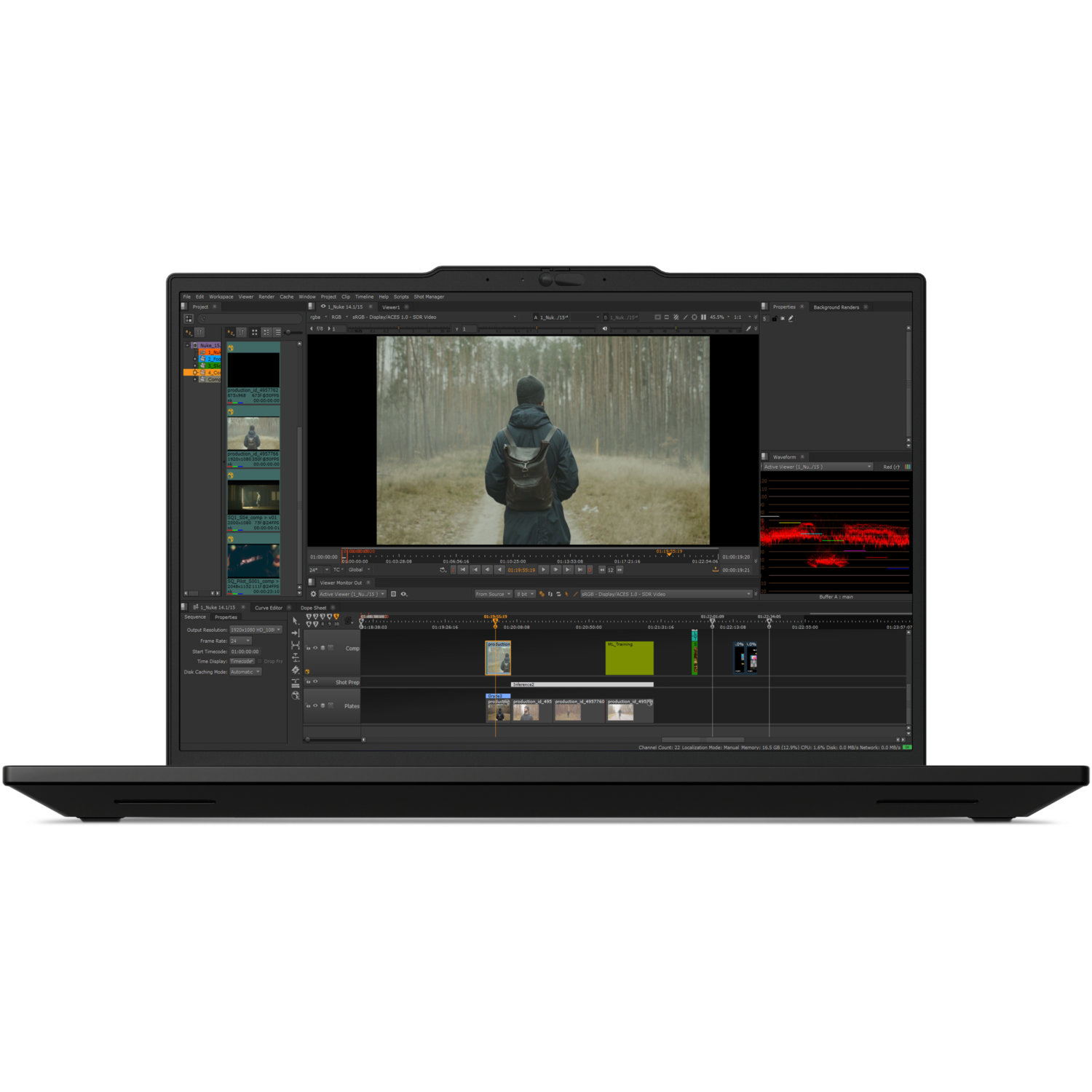 Laptop displaying video editing software. A person with a backpack stands in a forest scene within the video.
