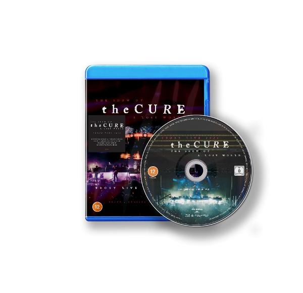 Blu-ray en disc voor The Cure's 'The Show of a Lost World' concert. De hoes is blauw, de disc donker met concertbeelden.
