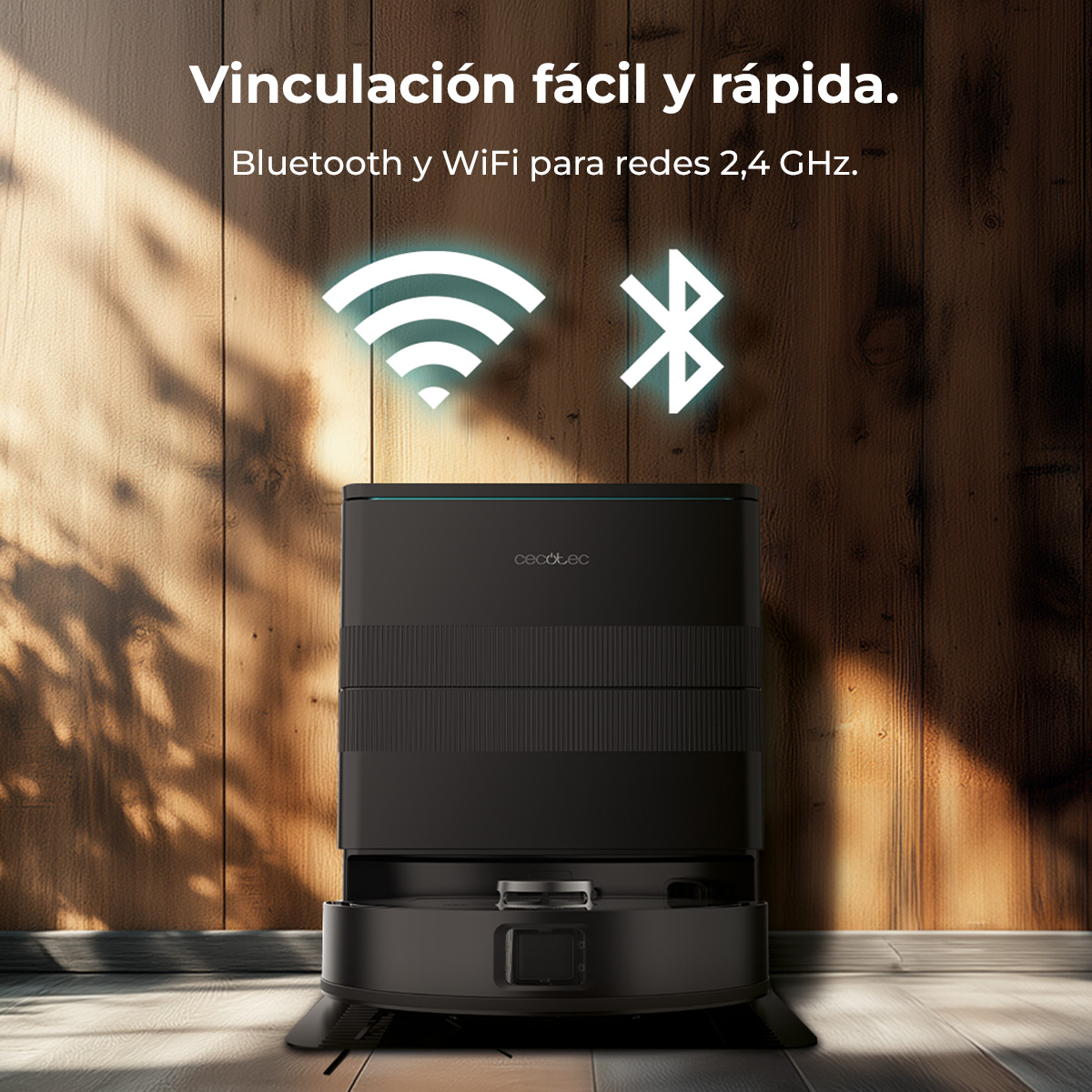 Un robot aspirador negro sobre un suelo de madera, con iconos de Wifi y Bluetooth. El texto dice 'Vinculación fácil y rápida'.