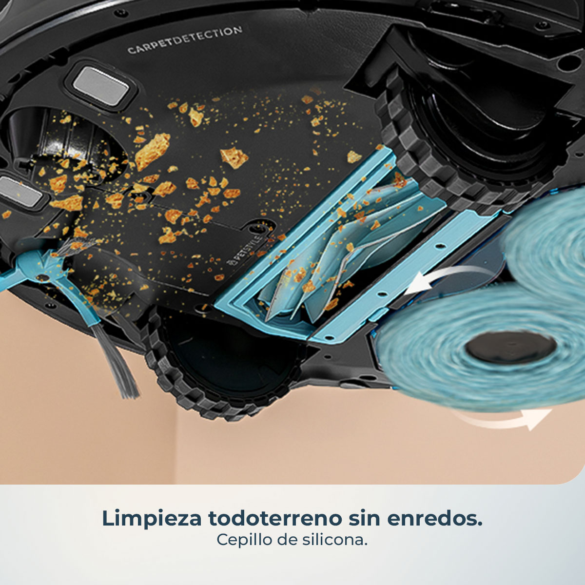 Aspiradora robot con partes negras y turquesas. Tiene un cepillo de limpieza y rollos de material azul.
