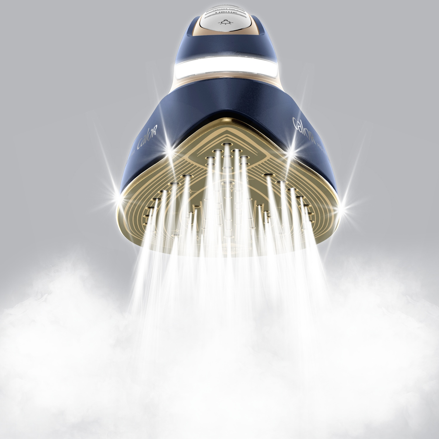 A dark blue and gold iron steaming. The steam is white, emanating from the gold base. The background is a gradient gray.