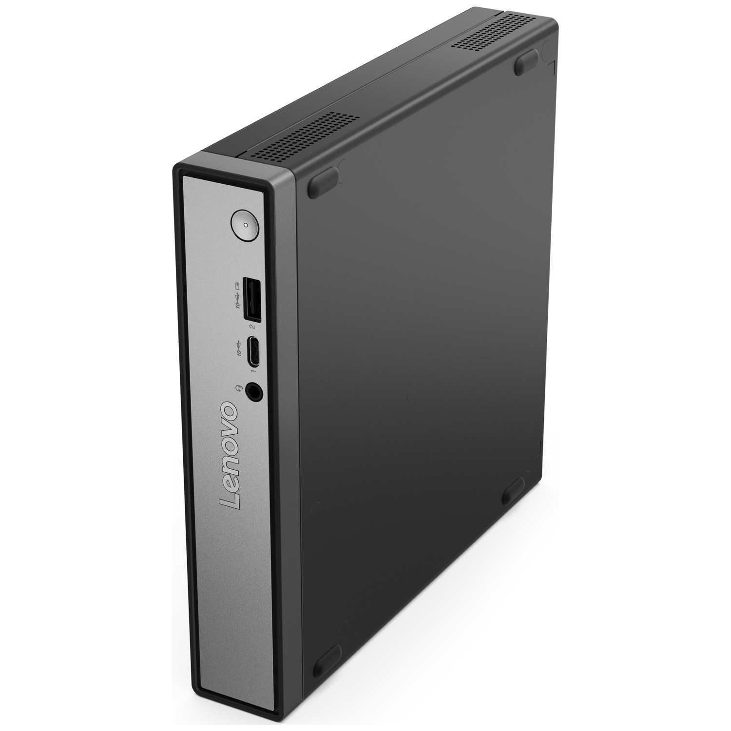 A black Lenovo desktop computer stands on a white surface. It has a silver front with ports and the Lenovo logo.