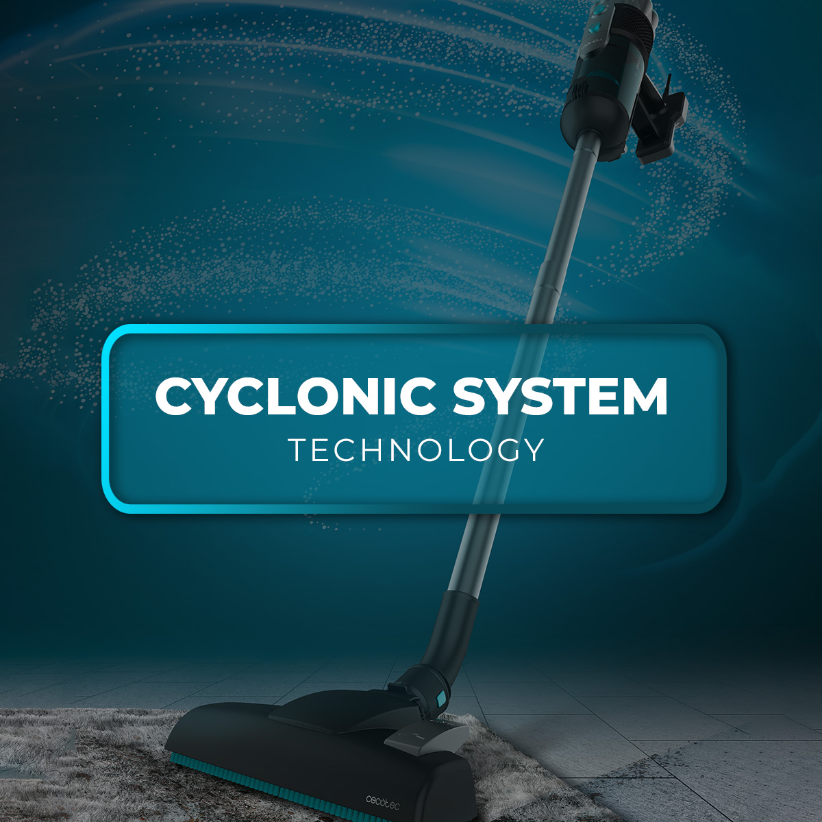 Una aspiradora inalámbrica sobre una alfombra gris contra un fondo azul, con 'CYCLONIC SYSTEM TECHNOLOGY' escrito.