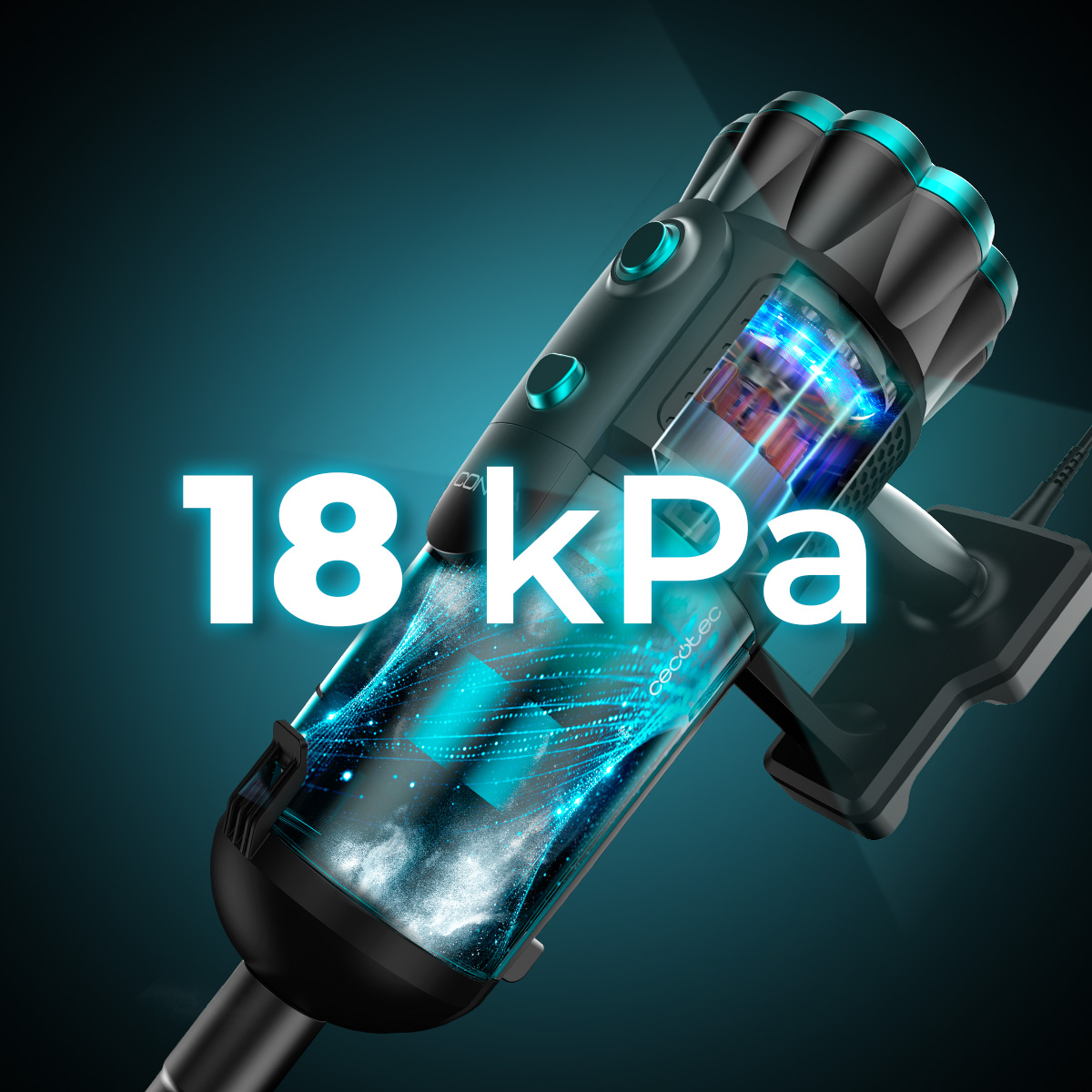 Se muestra una aspiradora de mano. Tiene el texto "18 kPa" superpuesto. La aspiradora es negra y verde azulado, sobre un fondo verde azulado.