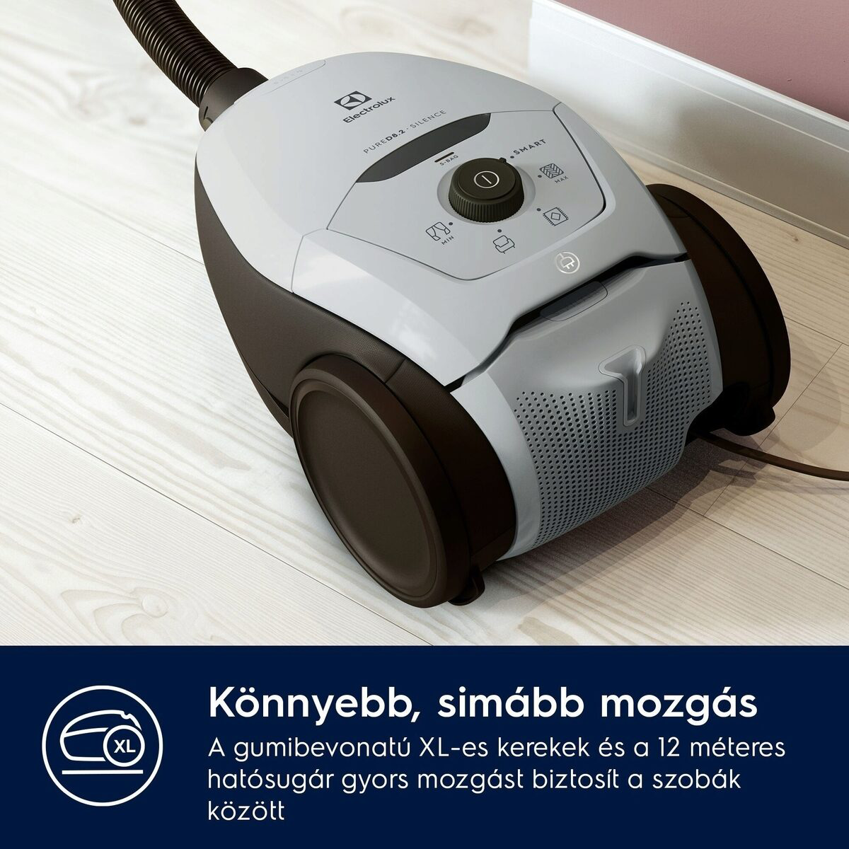 Egy szürke-fekete Electrolux porszívó fa padlón, szöveggel, amely a könnyű mozgást hirdeti.