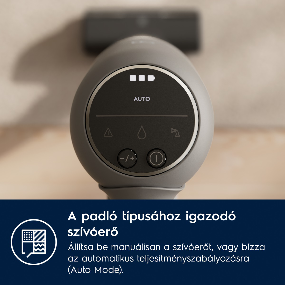 A porszívó vezérlőpaneljének közelképe. Automatikus üzemmóddal, akkumulátorjelzővel, valamint be- és kikapcsoló gombokkal rendelkezik.