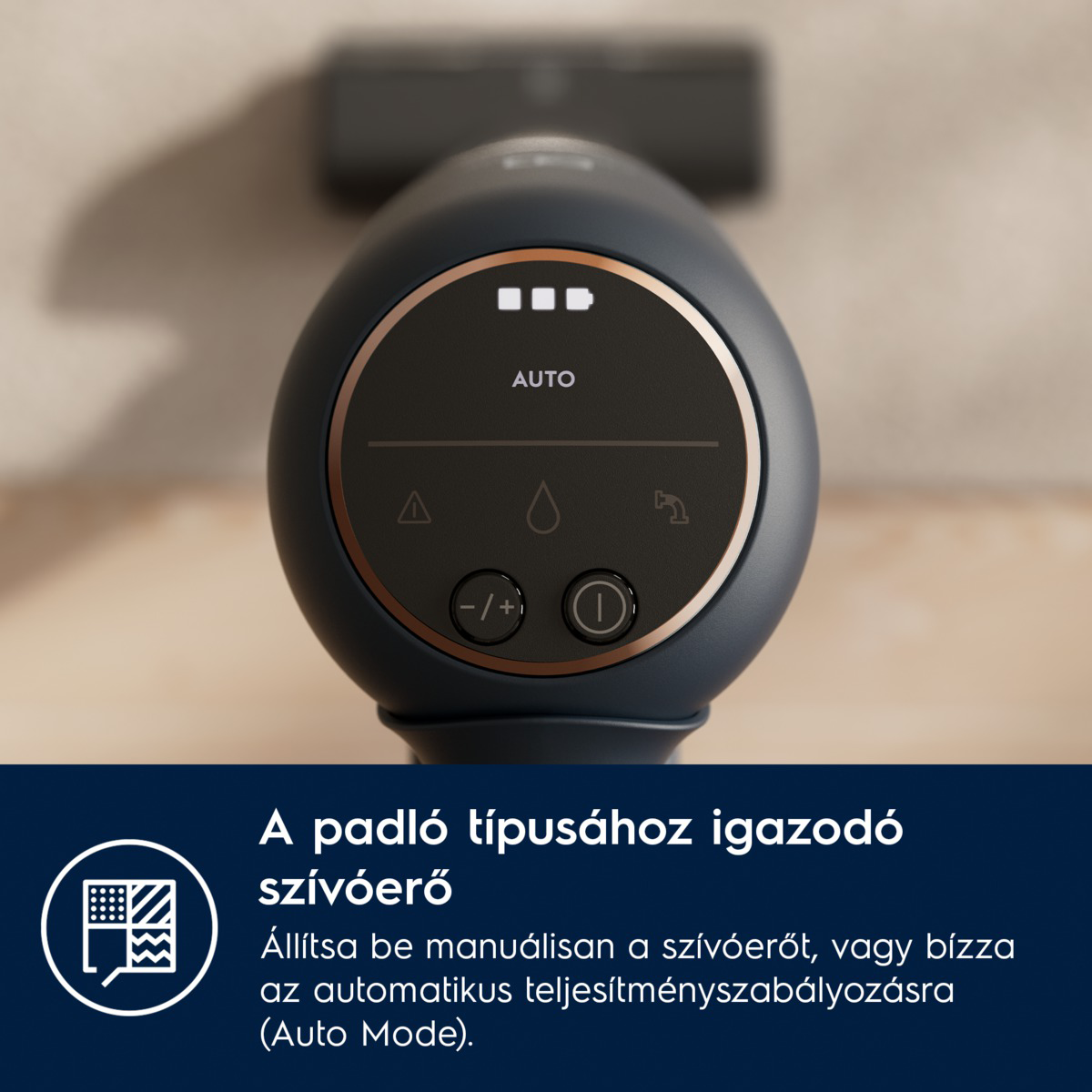 A porszívó vezérlőpaneljének közelképe. Az akkumulátort, az Auto módot, a teljesítmény- és szívóerő gombokat mutatja.